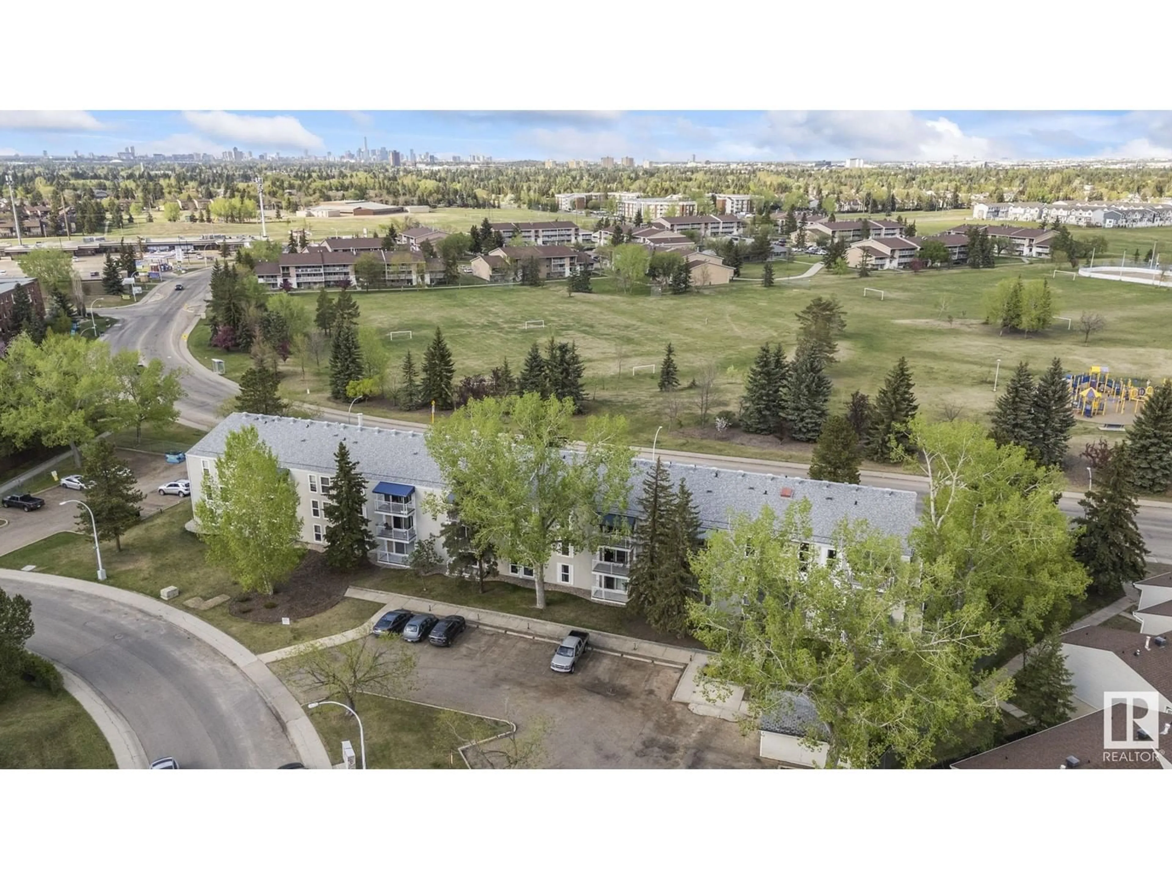 A pic from outside/outdoor area/front of a property/back of a property/a pic from drone, mountain view for #204 - 2545 116 ST, Edmonton Alberta T6J3Z7
