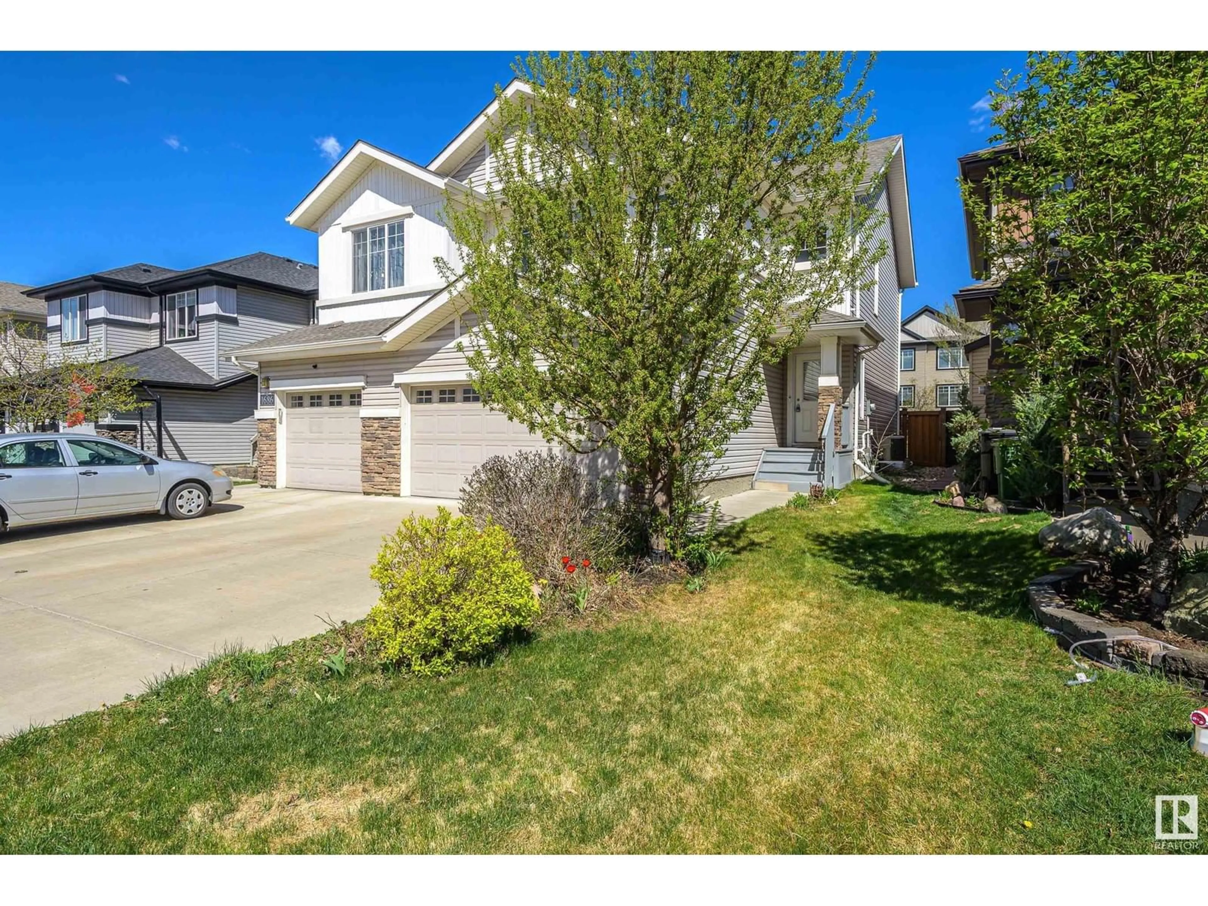 A pic from outside/outdoor area/front of a property/back of a property/a pic from drone, street for SW - 1684 CUNNINGHAM WY, Edmonton Alberta T6W0W5