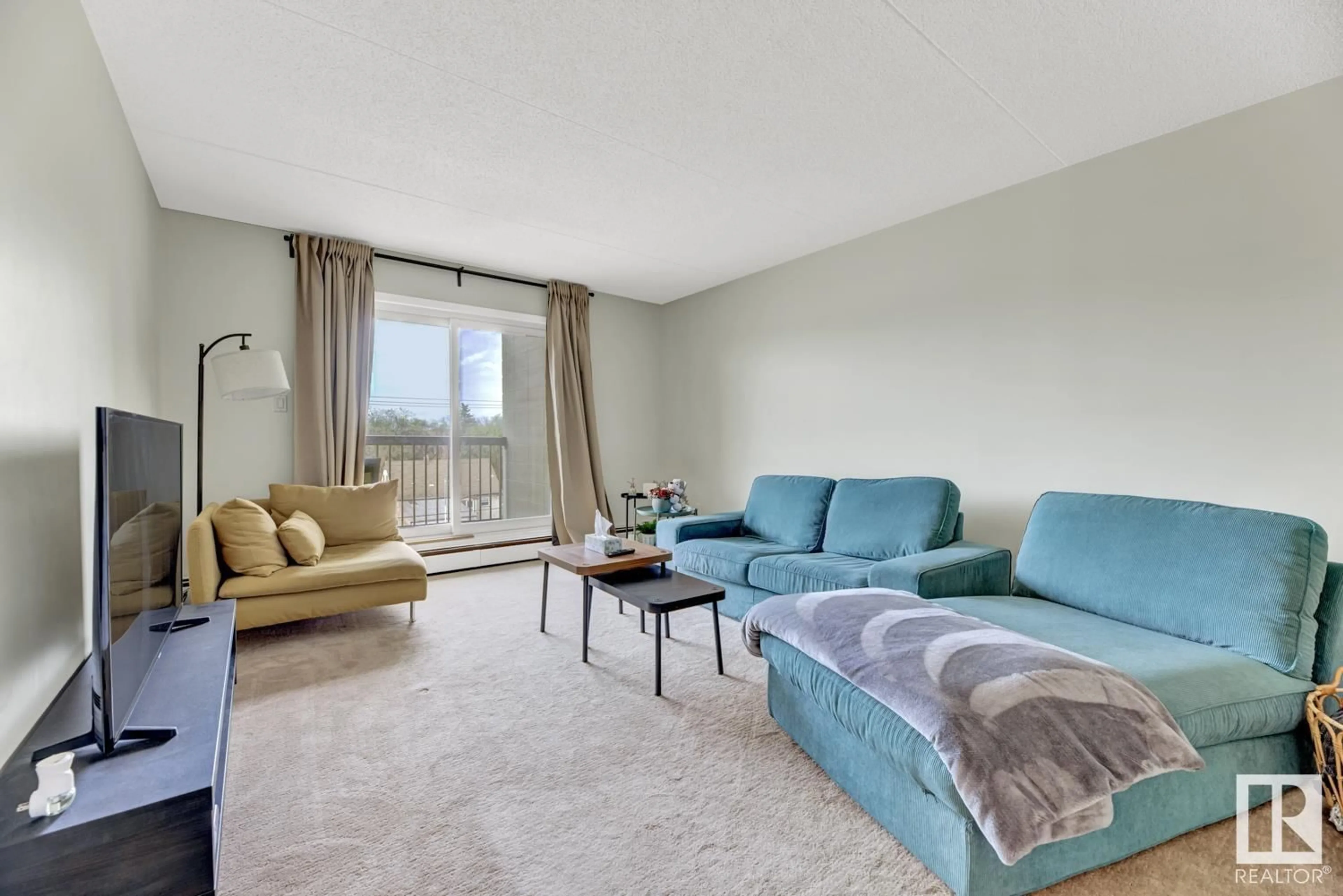 Living room with furniture, unknown for #404 - 11026 106 ST, Edmonton Alberta T5H2Y4
