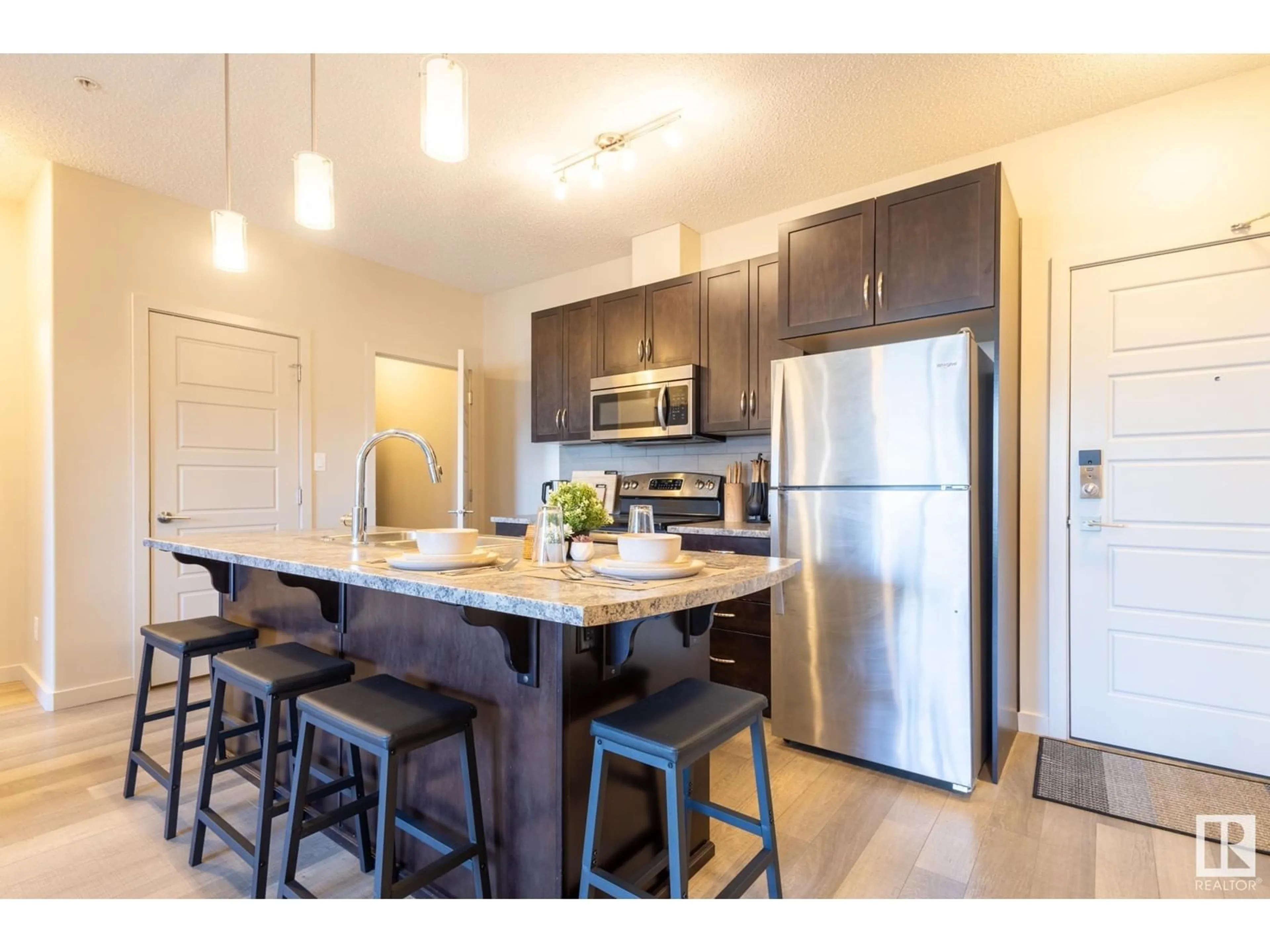 Open concept kitchen, unknown for 403 - 320 AMBLESIDE LINK, Edmonton Alberta T6W2Z9
