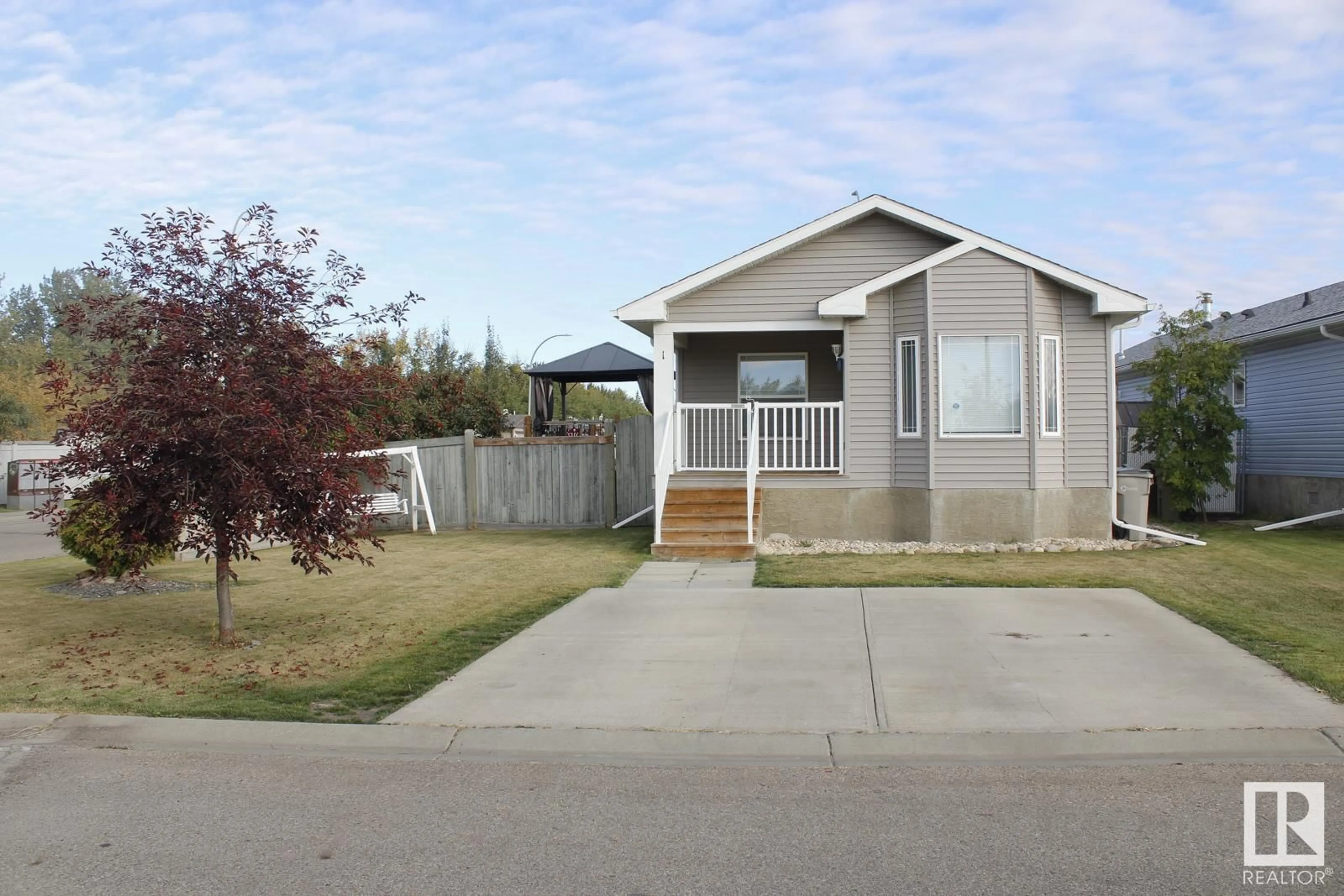 Home with vinyl exterior material, street for 1 JUTLAND CR, Stony Plain Alberta T7Z0A3