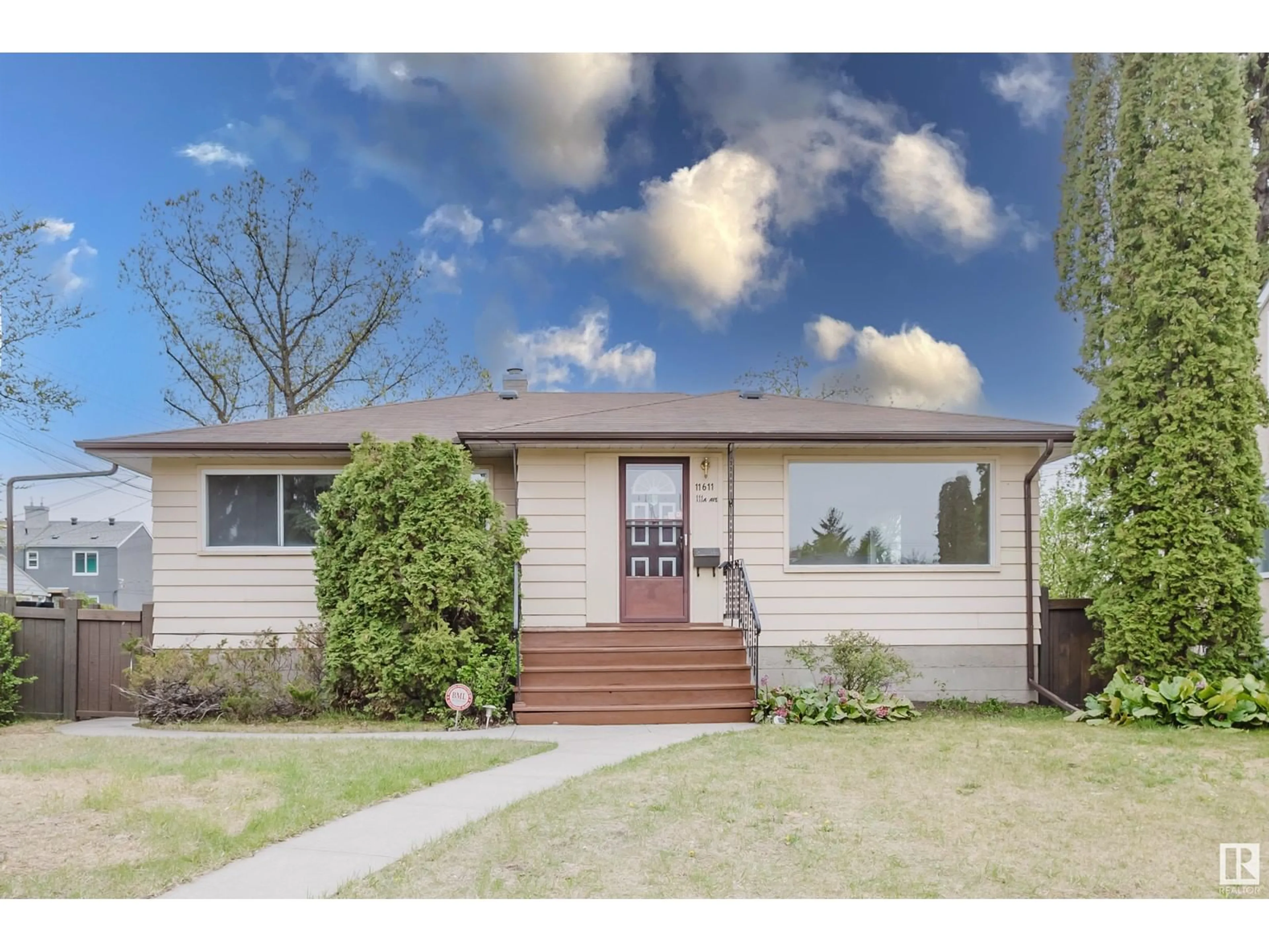 Home with vinyl exterior material, street for 11611 111A AV NW, Edmonton Alberta T5G0G2