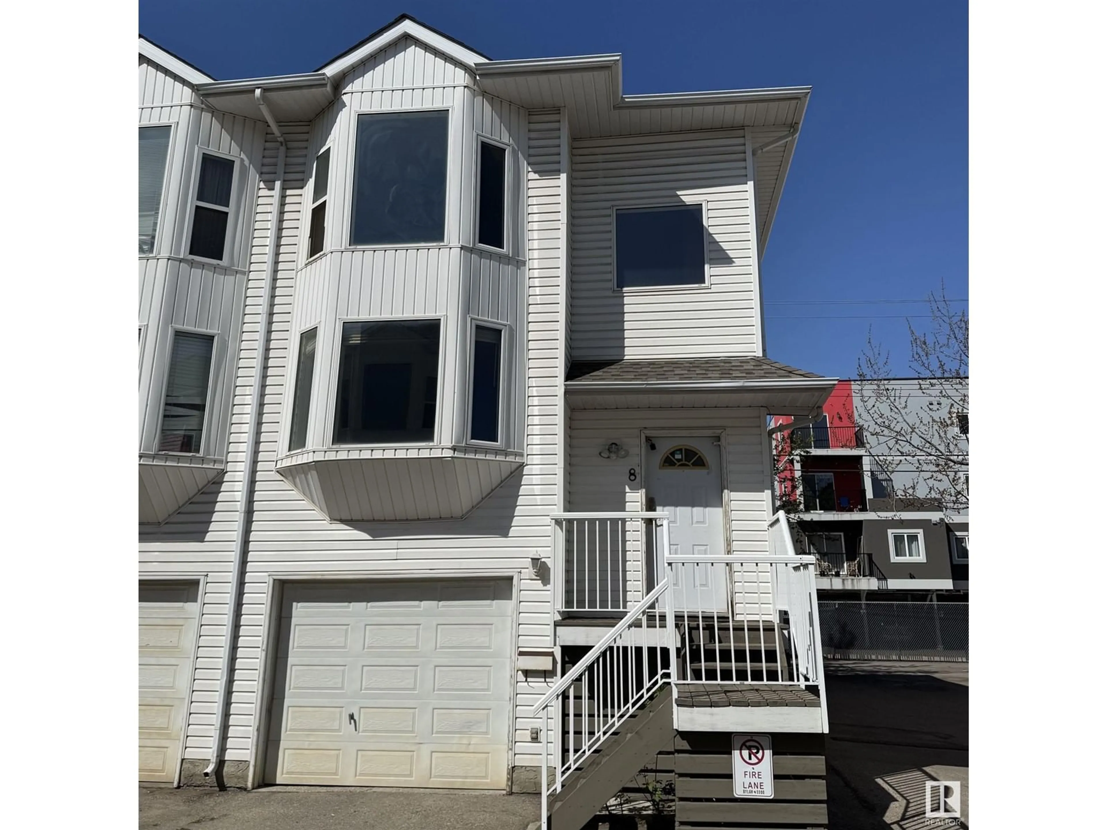 Home with vinyl exterior material, street for #8 - 11718 97 ST, Edmonton Alberta T5G1Y2