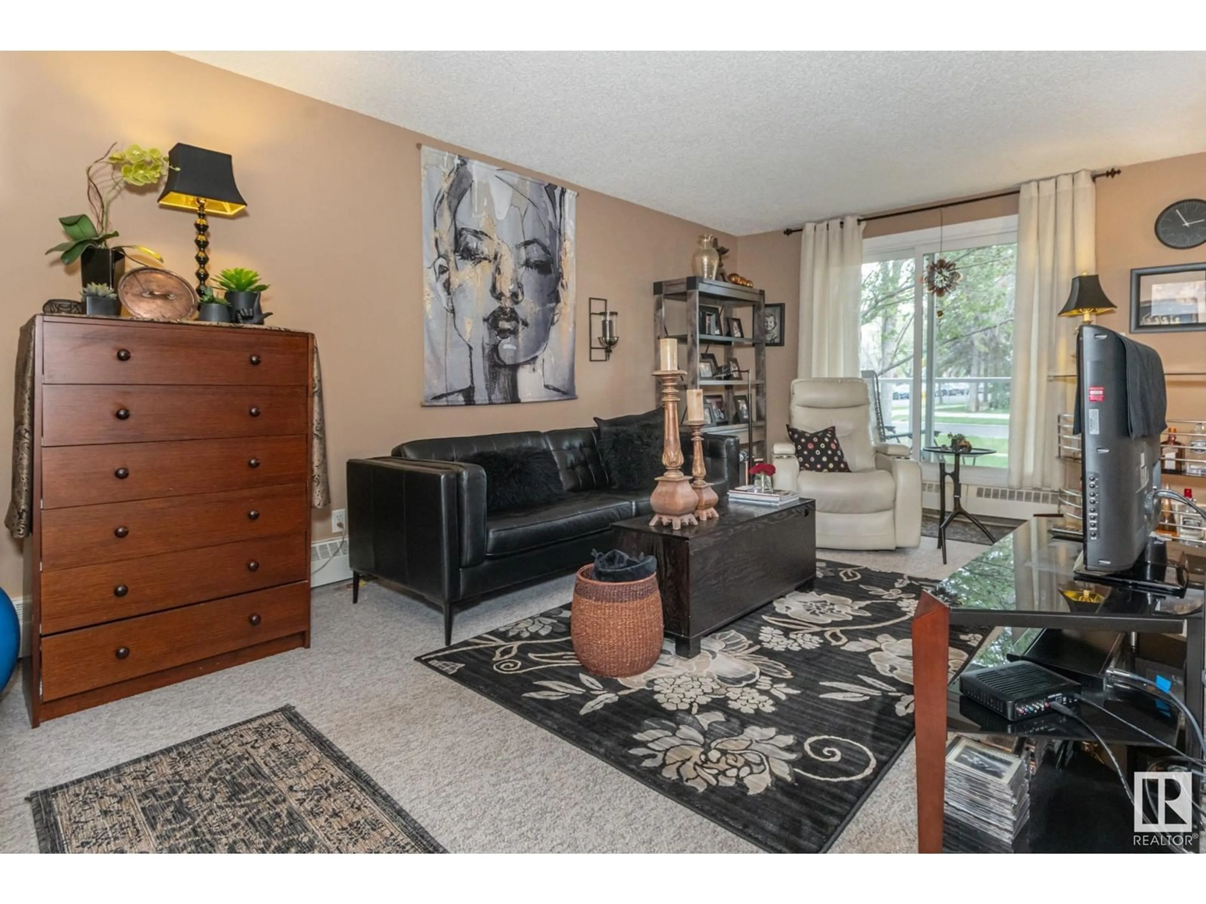 Living room with furniture, unknown for #106 - 10842 107 ST, Edmonton Alberta T5H2Z3