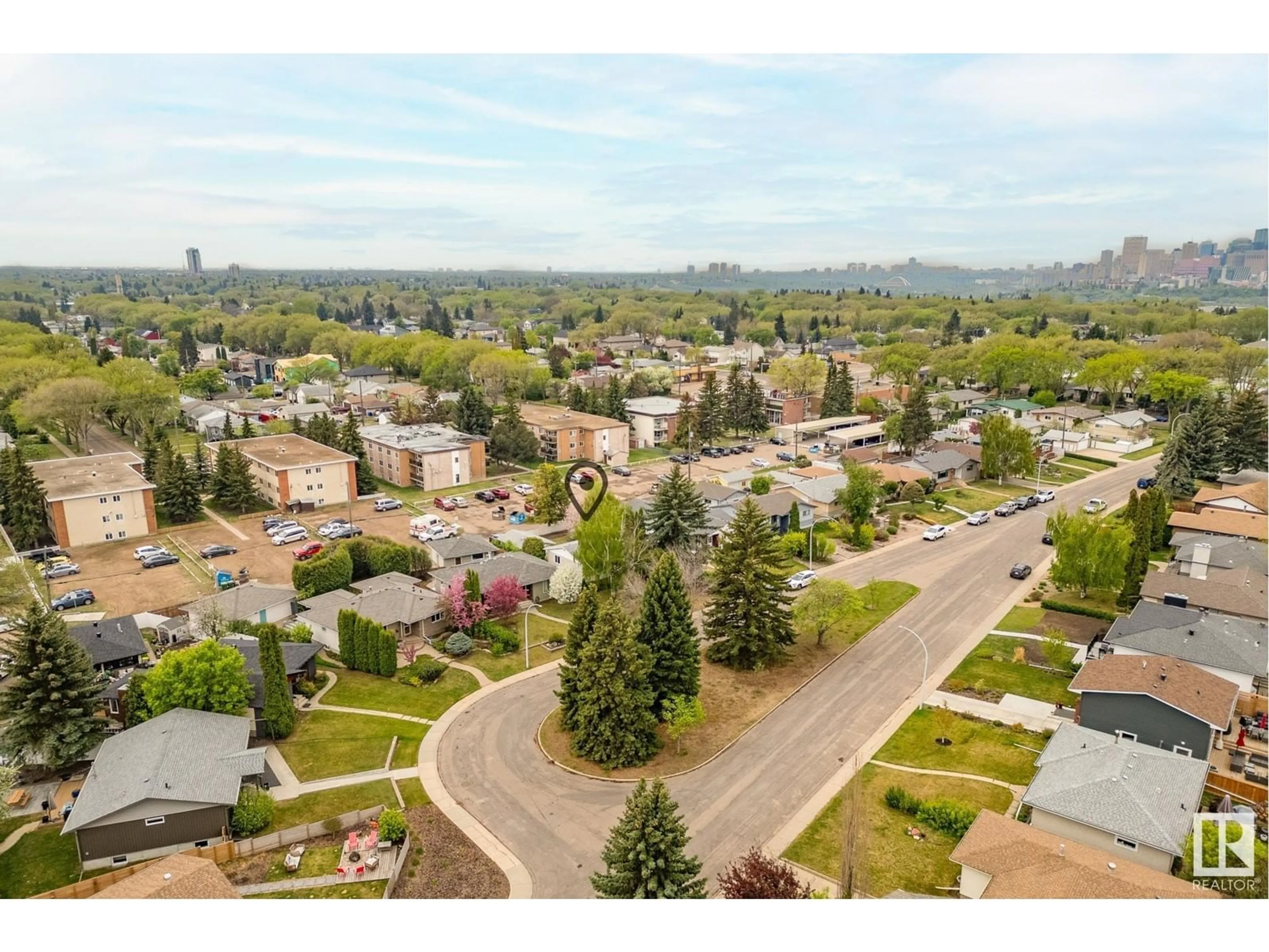 A pic from outside/outdoor area/front of a property/back of a property/a pic from drone, unknown for 7711 106A AV, Edmonton Alberta T6A1K5