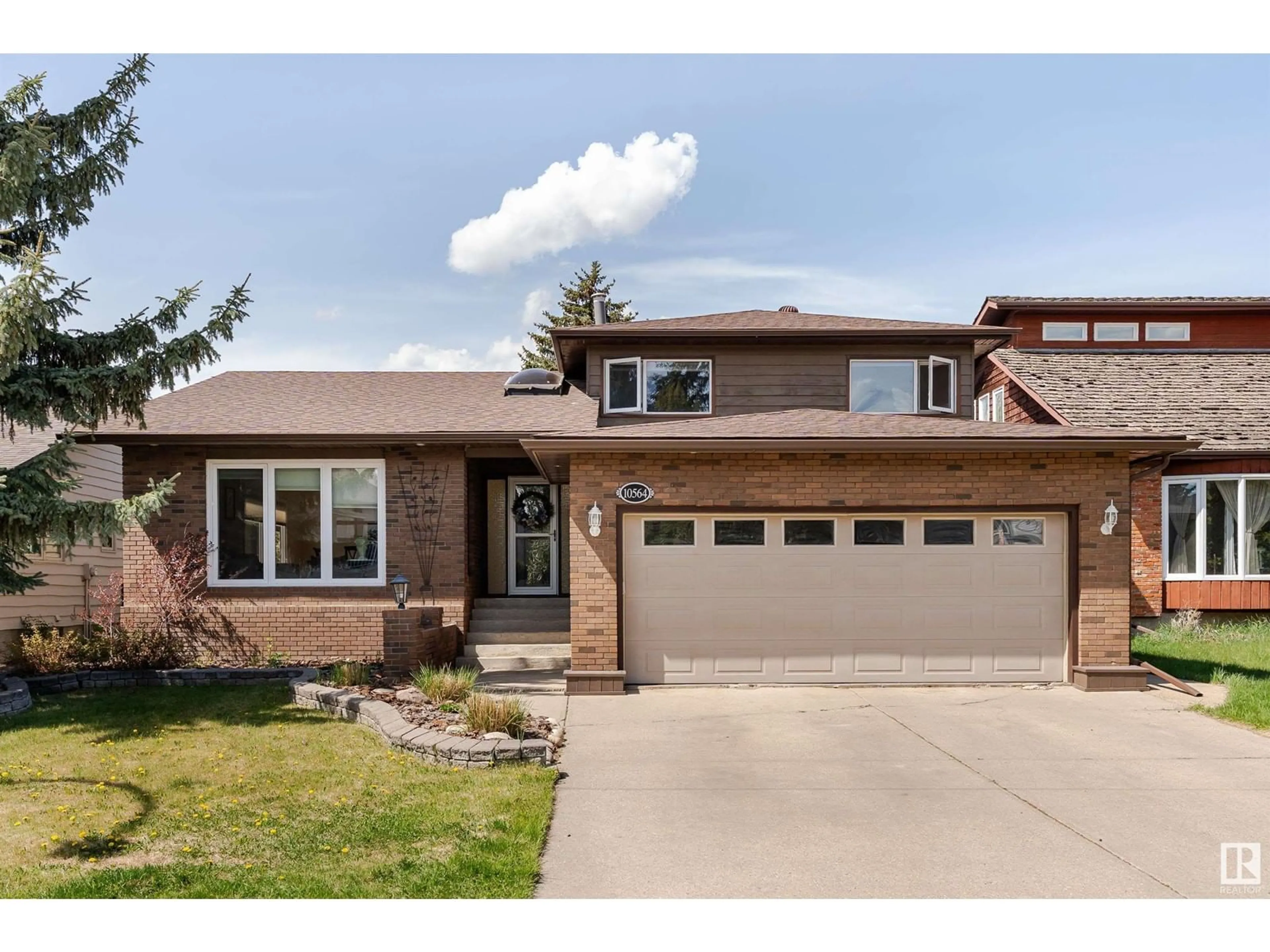 Home with brick exterior material, street for 10564 17 AV, Edmonton Alberta T6J5B5