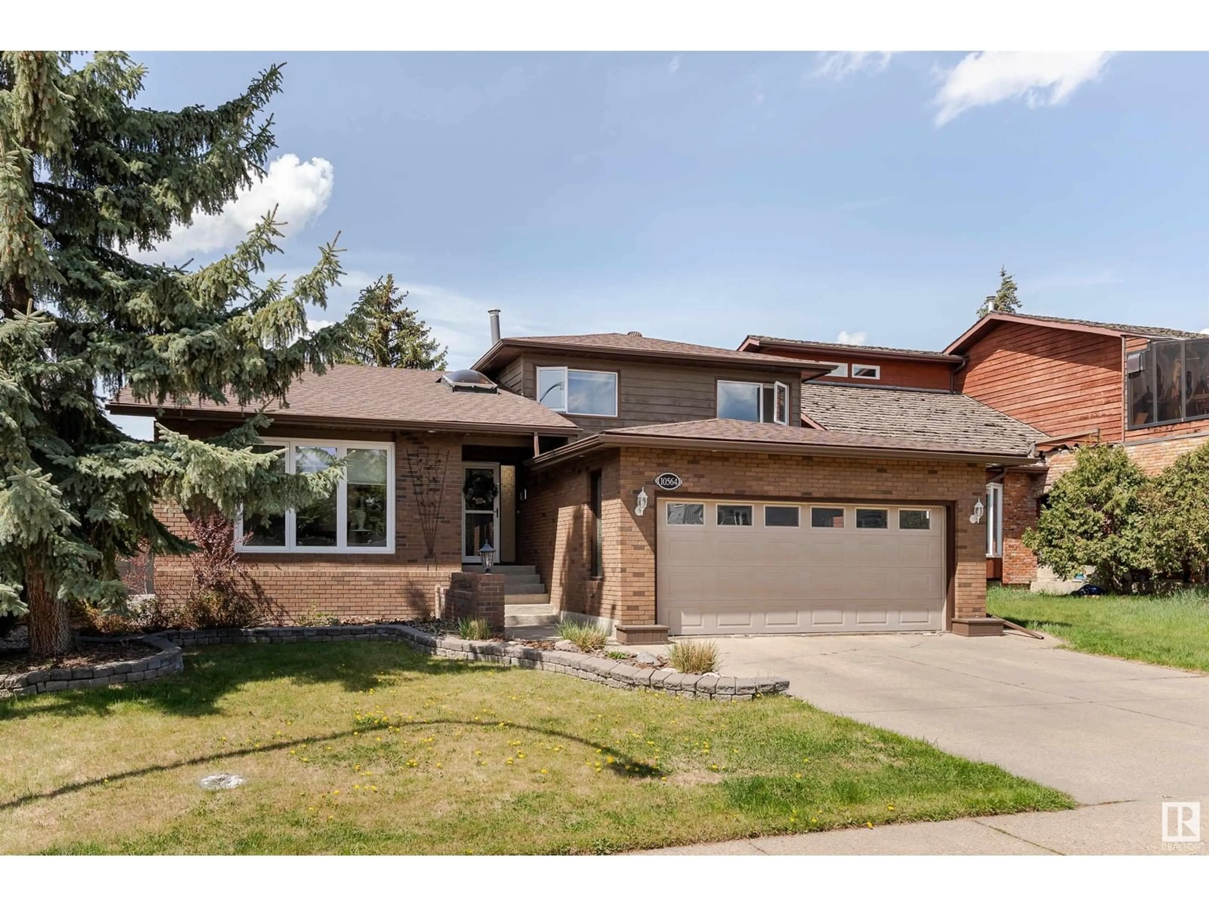 Home with brick exterior material, street for 10564 17 AV, Edmonton Alberta T6J5B5