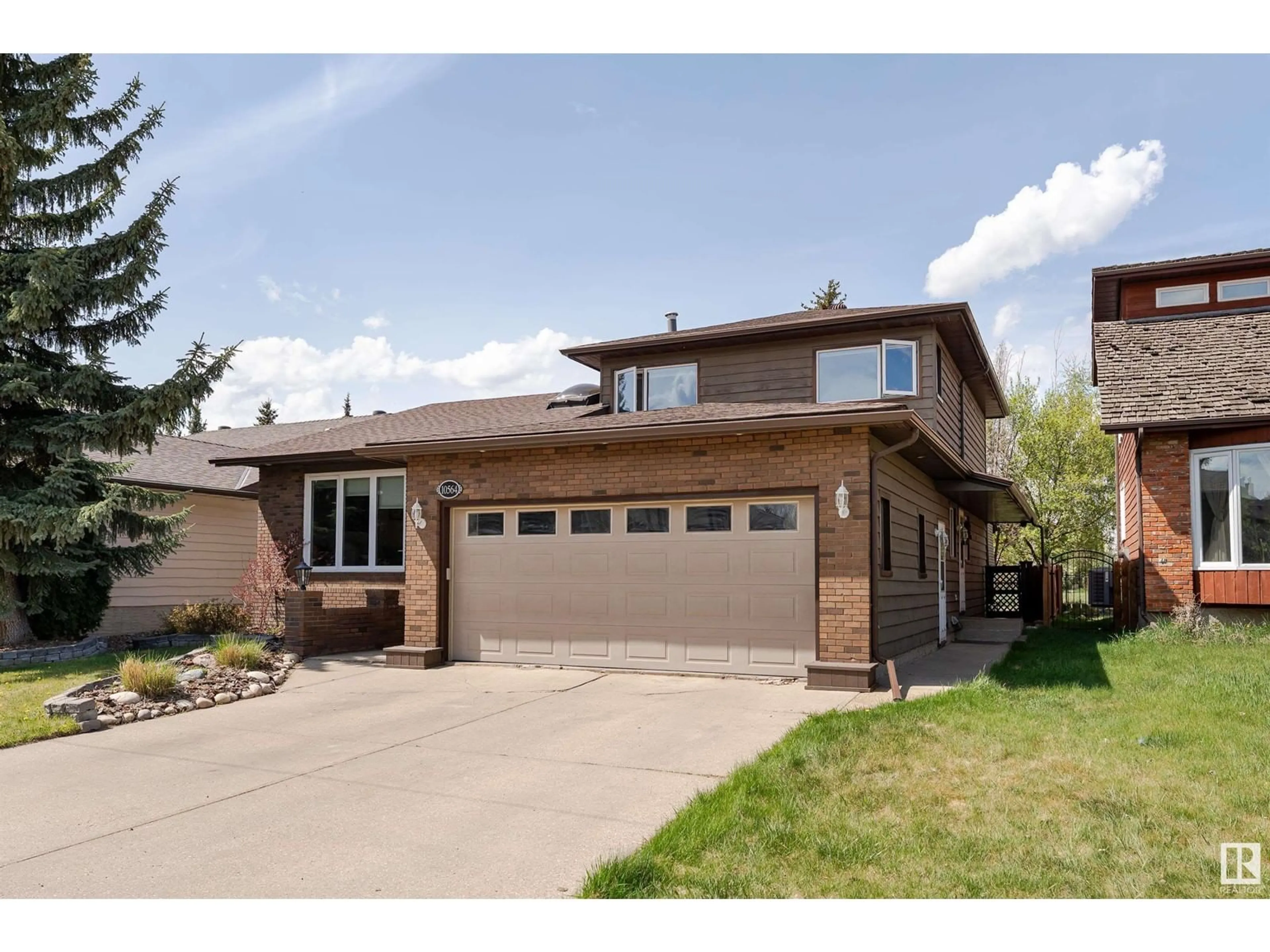Home with brick exterior material, street for 10564 17 AV, Edmonton Alberta T6J5B5