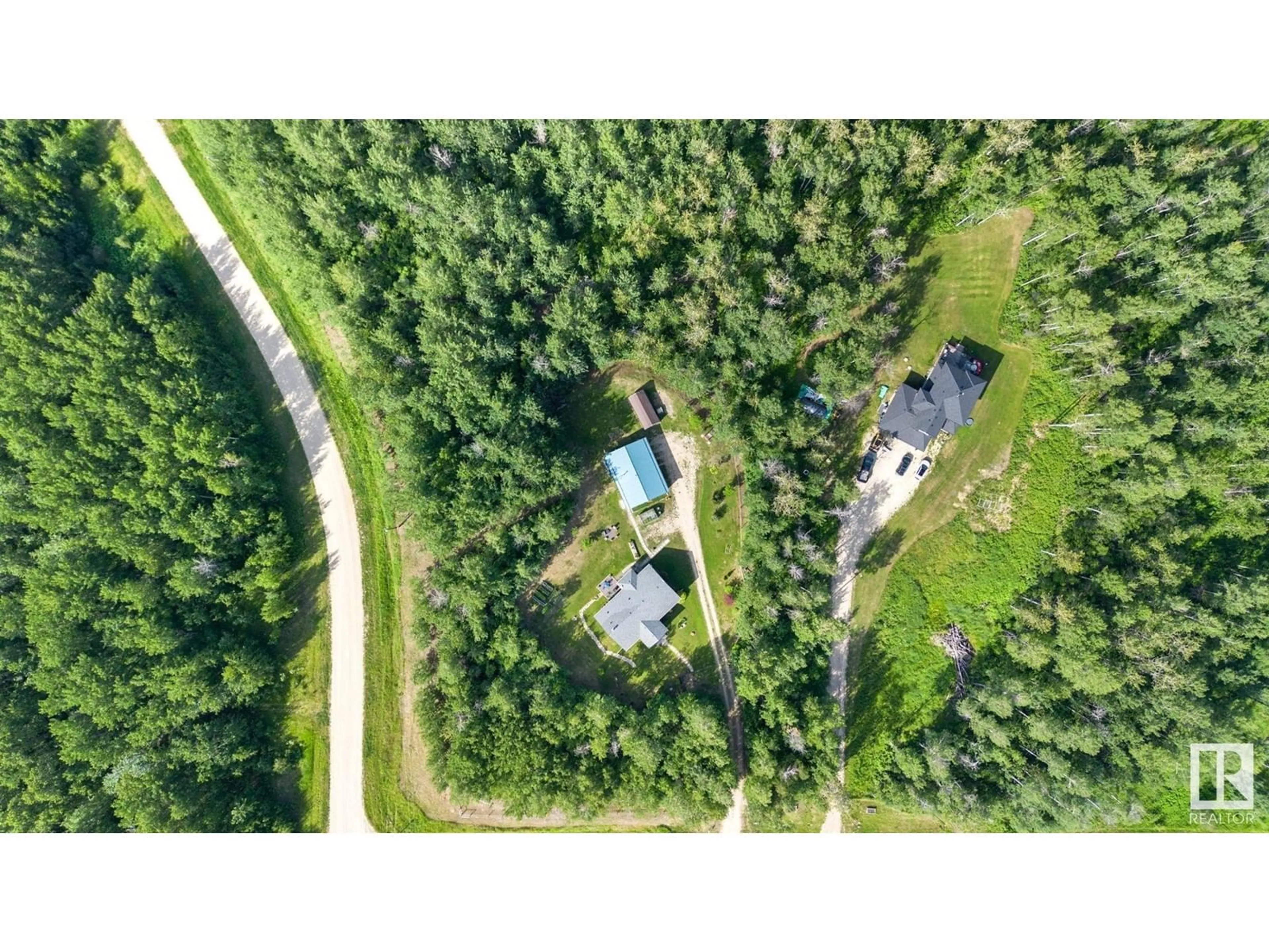 A pic from outside/outdoor area/front of a property/back of a property/a pic from drone, forest/trees view for 54419 RGE RD 14, Rural Lac Ste. Anne County Alberta T0E1V0