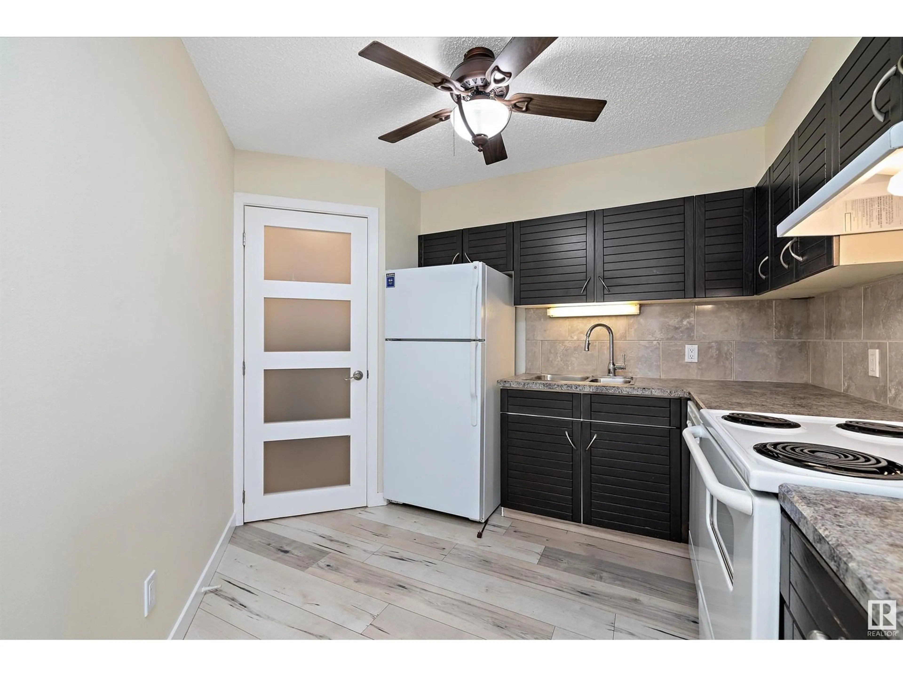 Standard kitchen, wood/laminate floor for 1109 SASKATCHEWAN DR, Edmonton Alberta T6E6B6