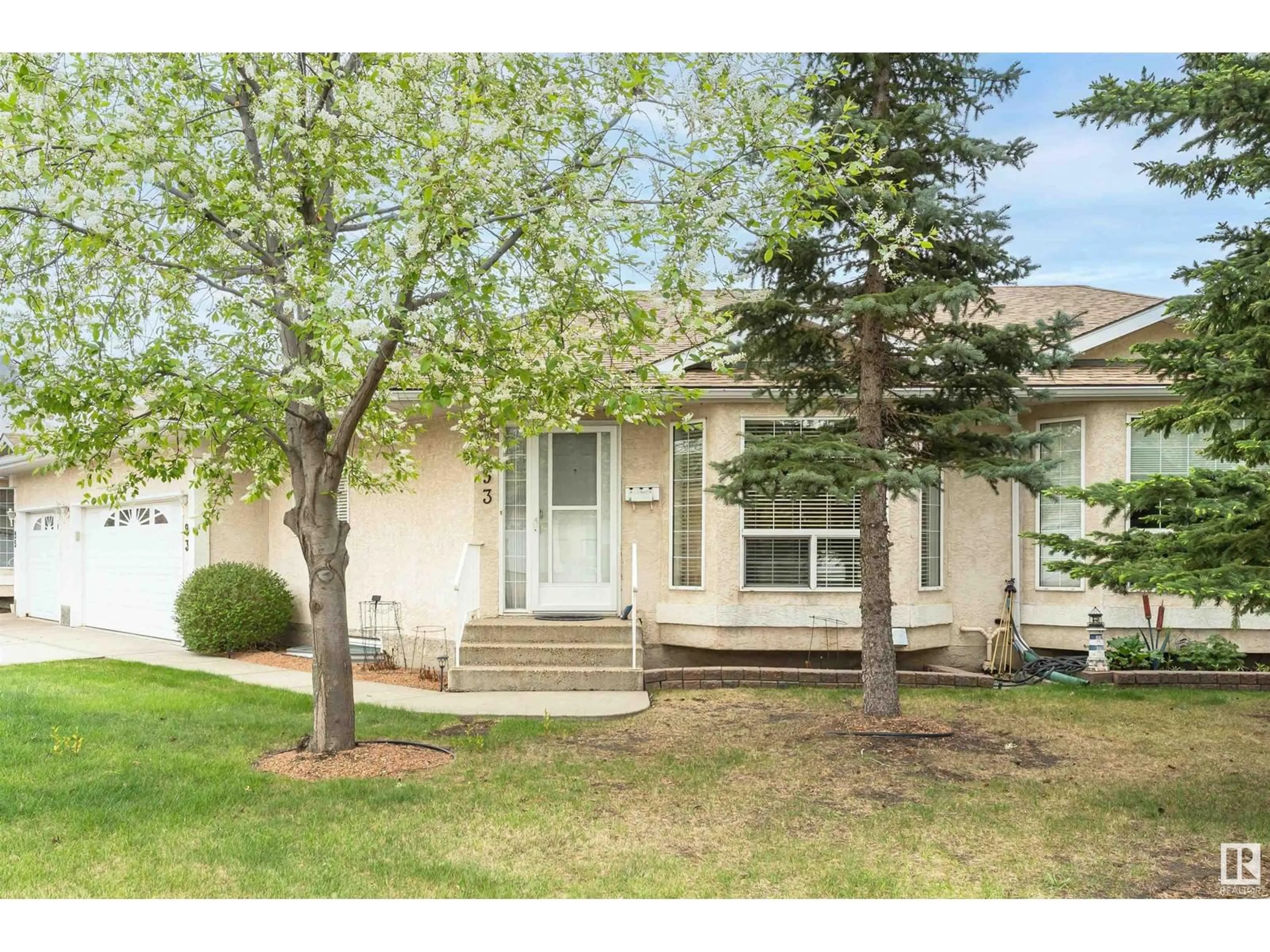 Home with vinyl exterior material, street for 13320 - 93 124 ST, Edmonton Alberta T5L5B7