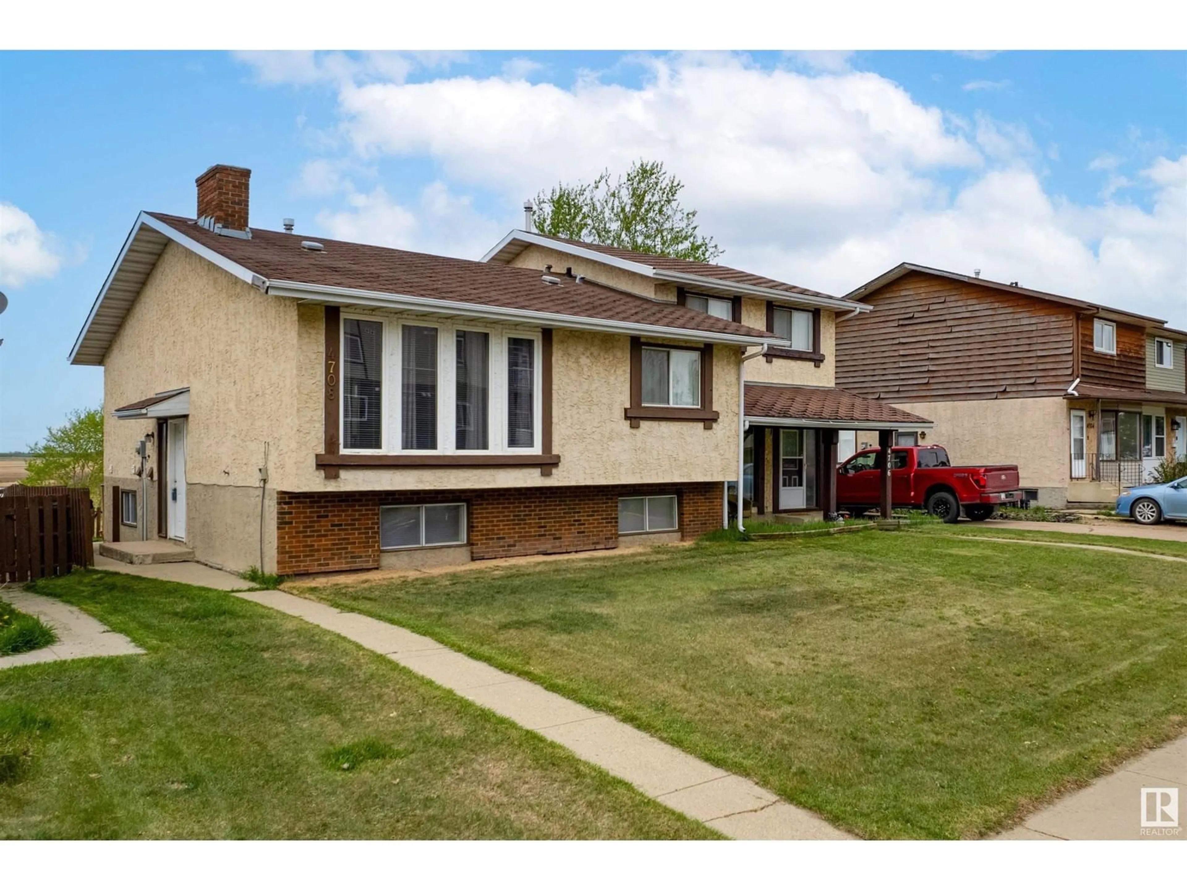 Home with brick exterior material, street for 4708 56 AV, Bruderheim Alberta T0B0S0