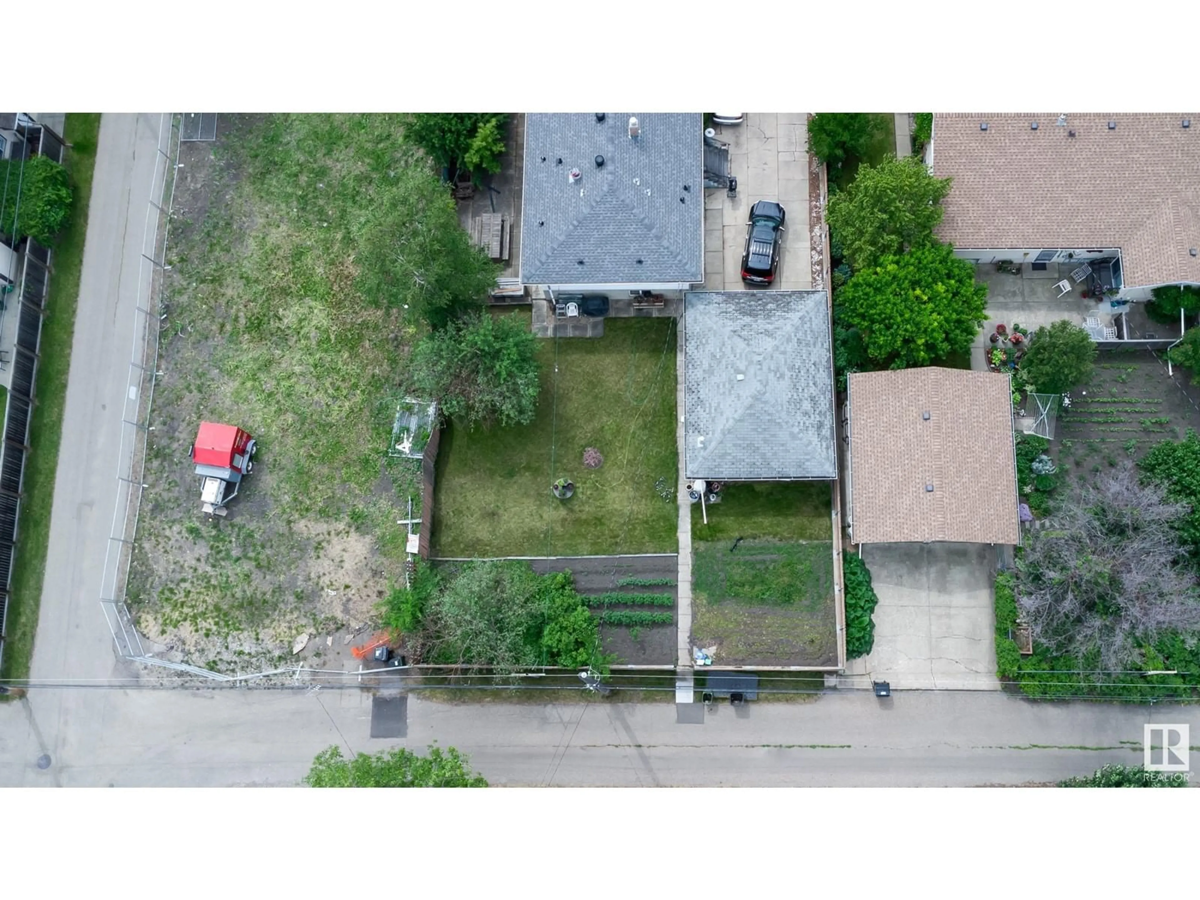 A pic from outside/outdoor area/front of a property/back of a property/a pic from drone, street for NW - 8316 73 AV, Edmonton Alberta T6C0E2