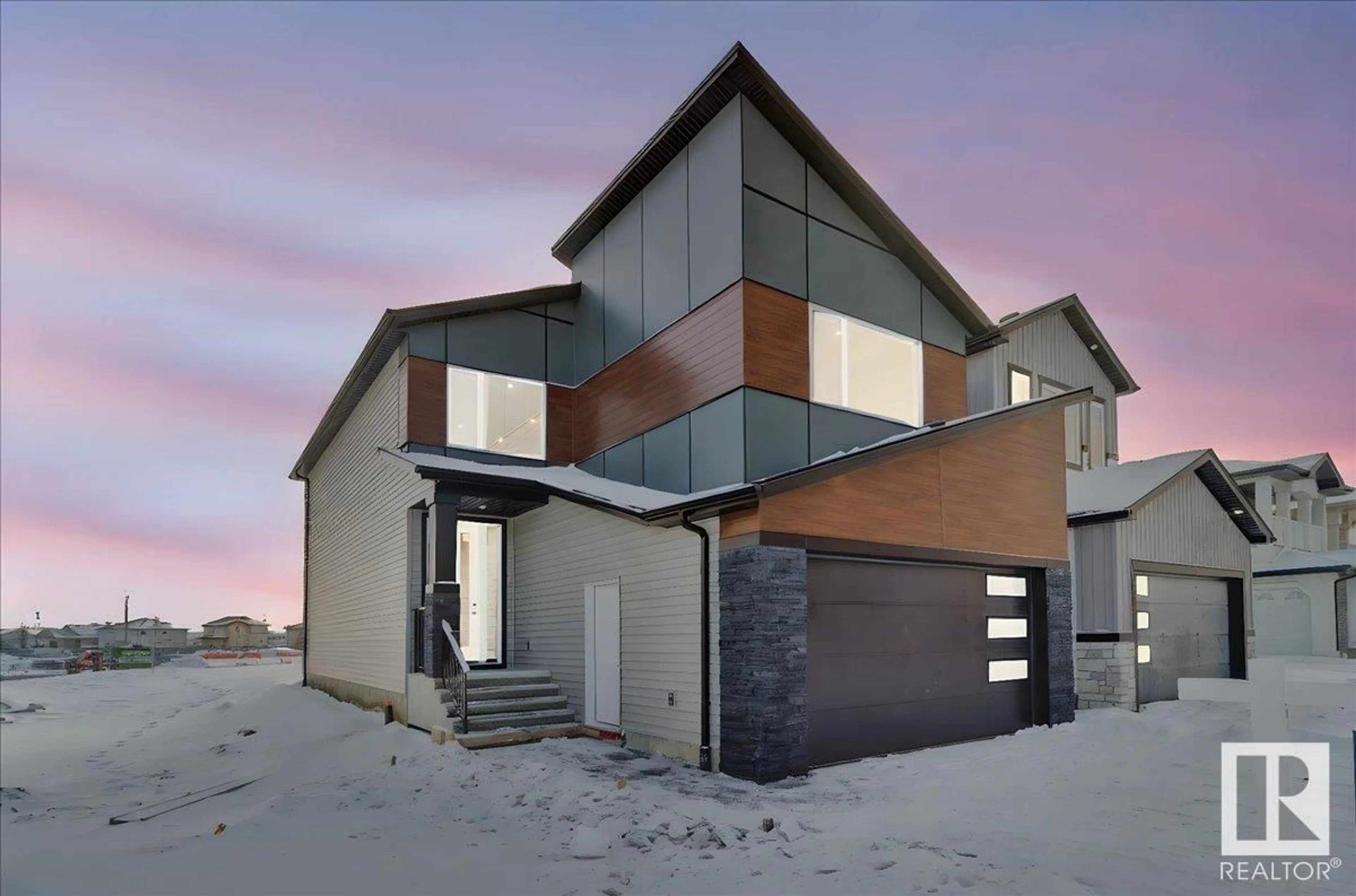 Home with brick exterior material, street for 7007 169 AV, Edmonton Alberta T5Z0H2