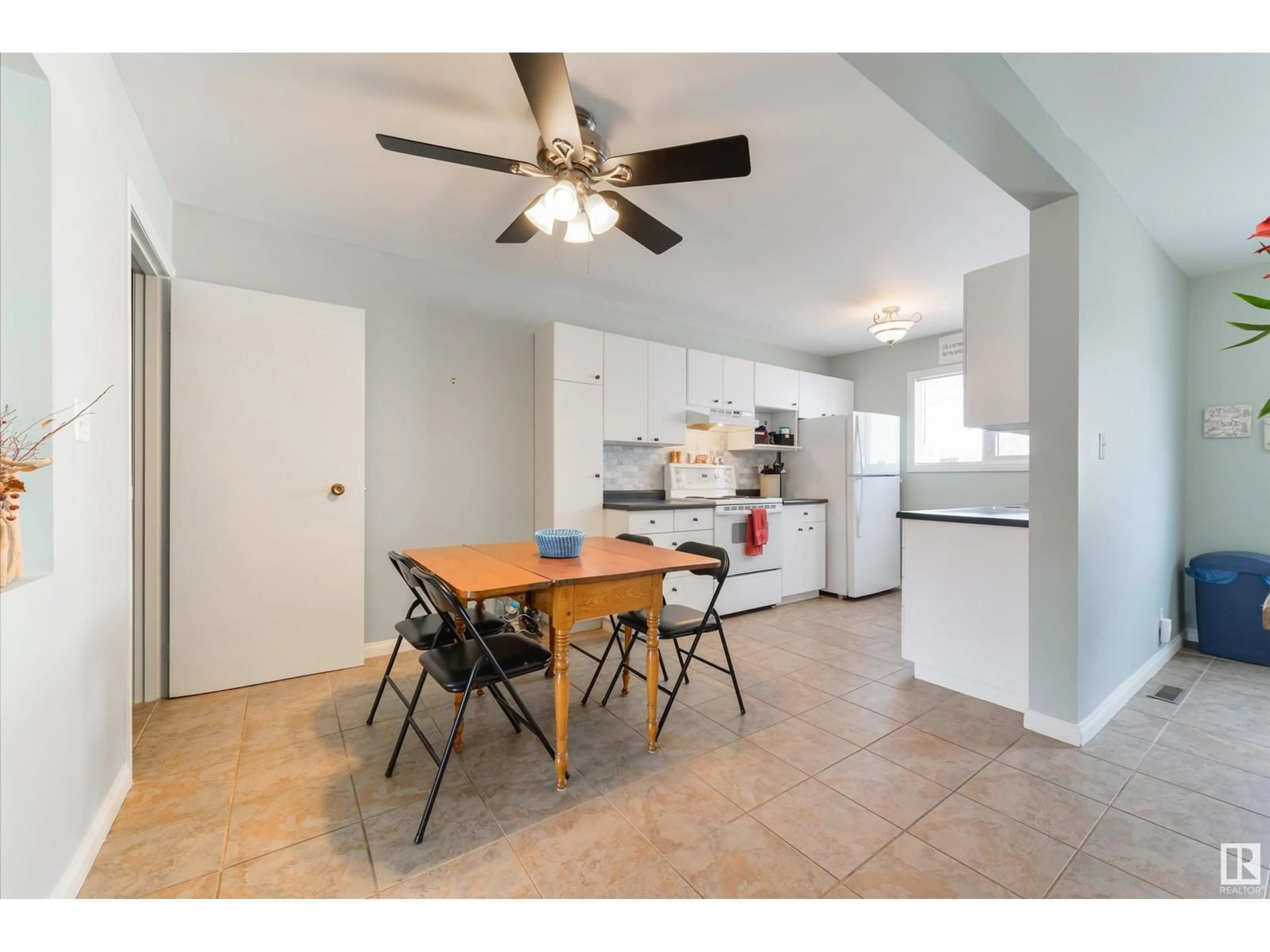 Open concept kitchen, ceramic/tile floor for NW - 11387 22 AV, Edmonton Alberta T6V4V8