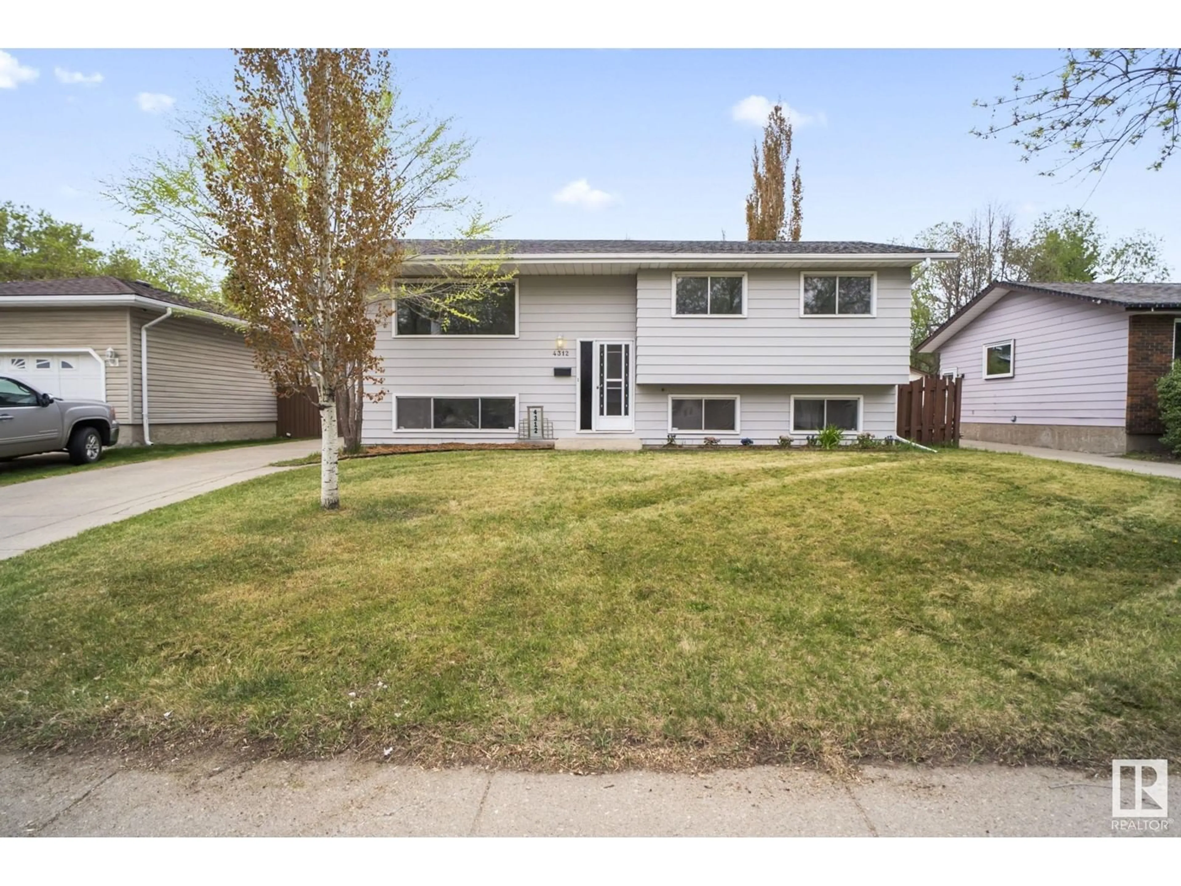 Home with vinyl exterior material, street for 4312 43 AV, Leduc Alberta T9E4R7