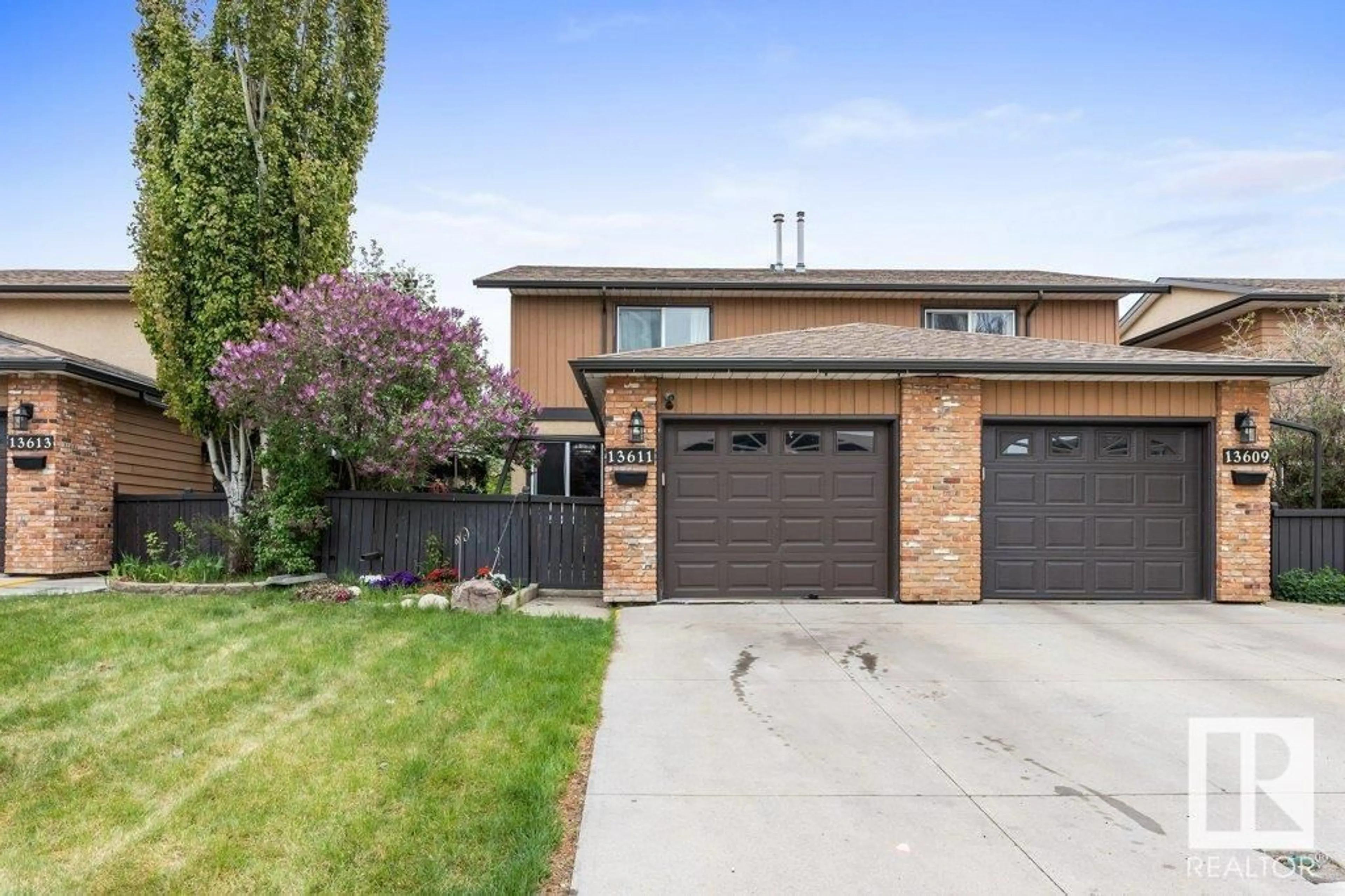 Home with brick exterior material, street for 13611 28 ST NW, Edmonton Alberta T5A4B5