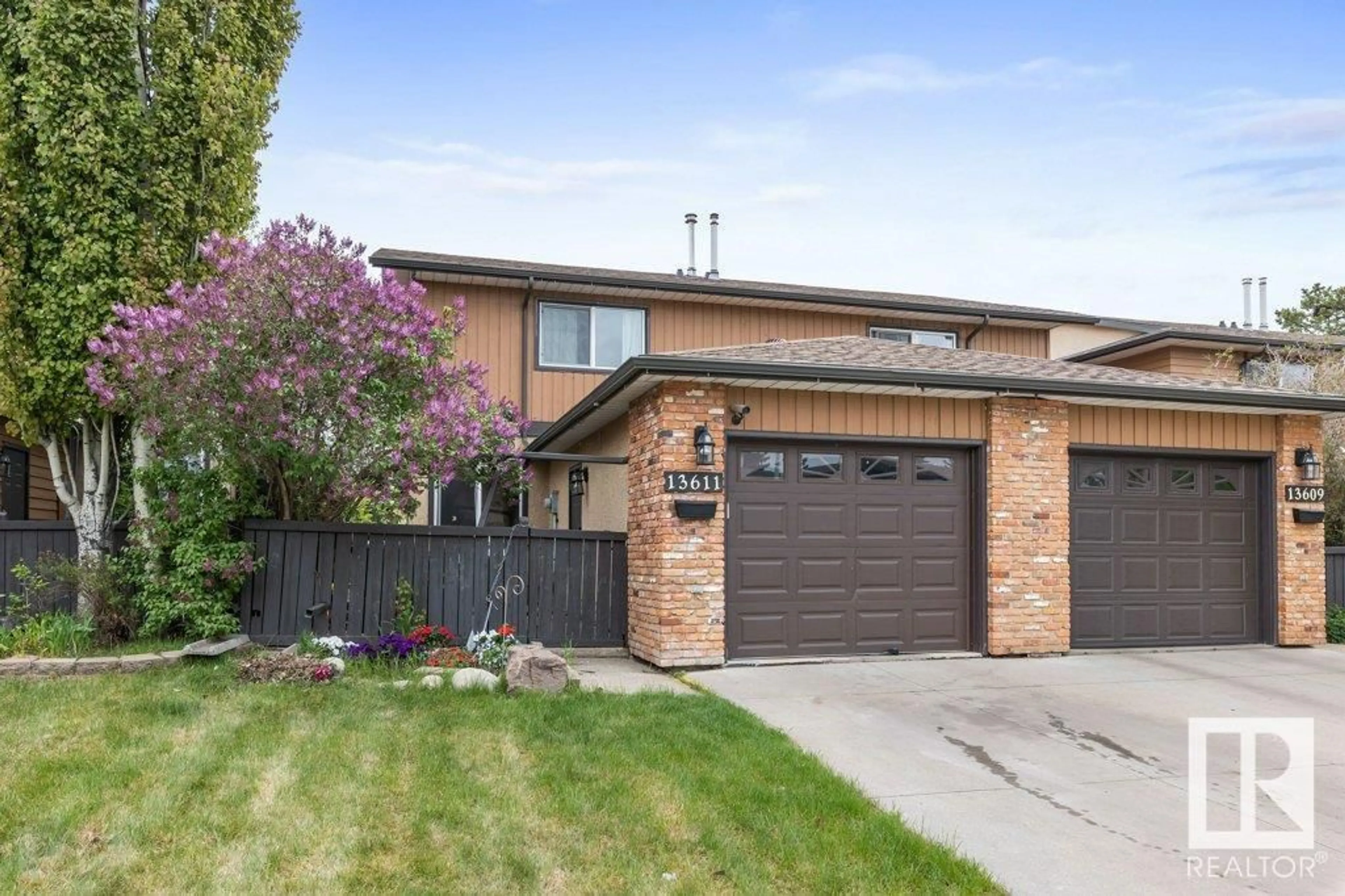 Home with brick exterior material, street for 13611 28 ST NW, Edmonton Alberta T5A4B5