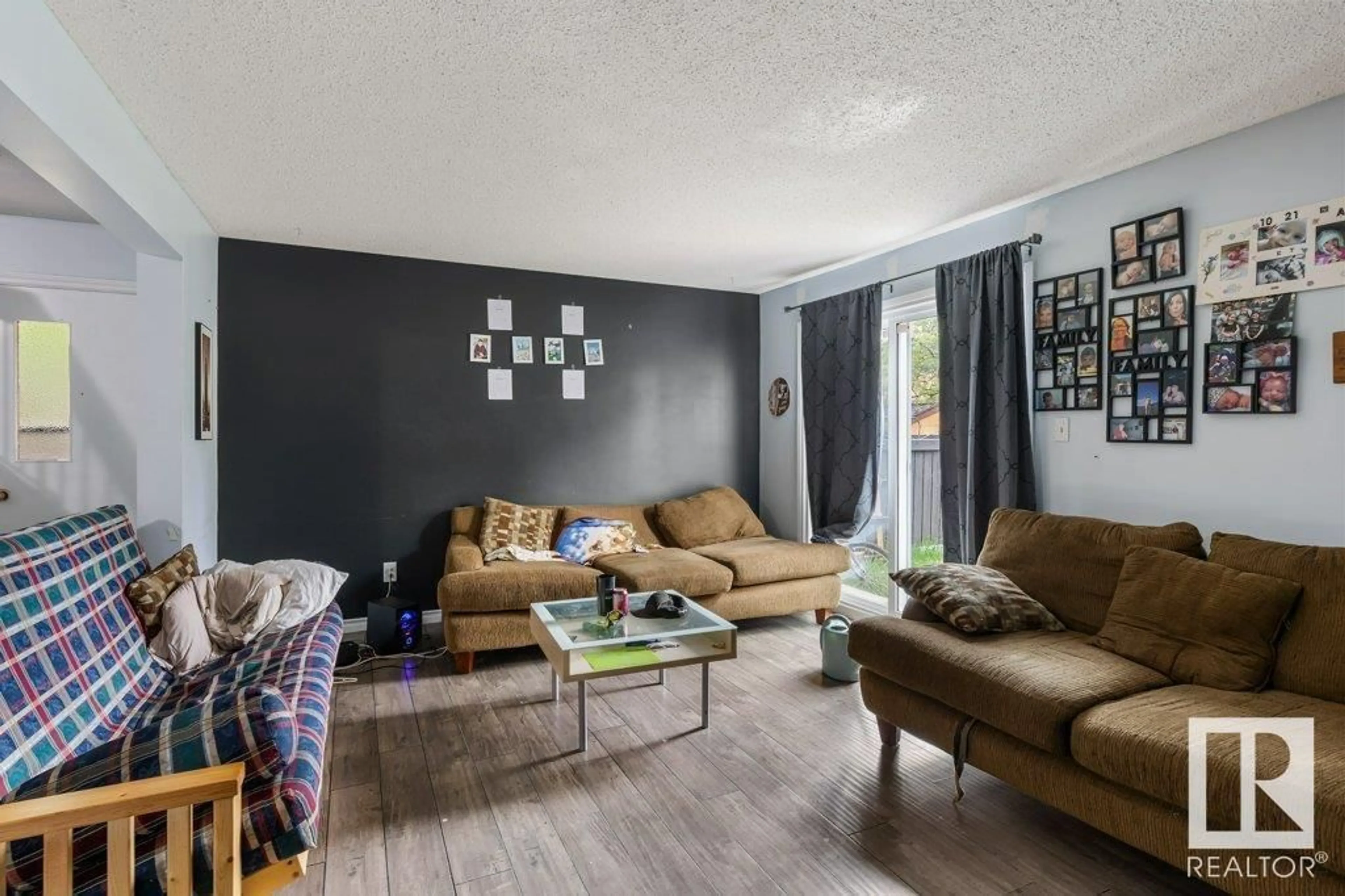 Living room with furniture, unknown for 13611 28 ST NW, Edmonton Alberta T5A4B5
