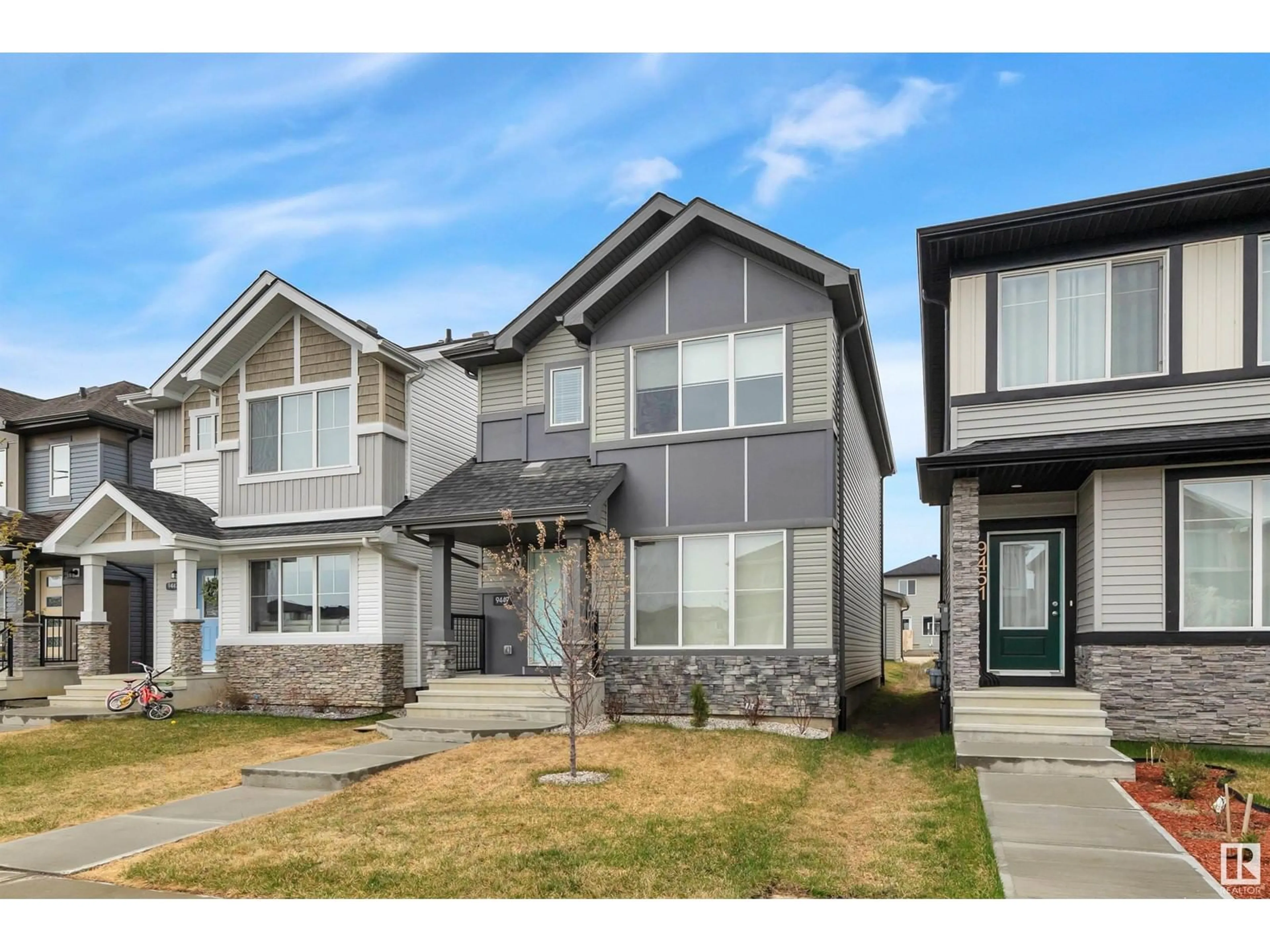 Home with vinyl exterior material, street for 9449 COLAK LN, Edmonton Alberta T6W5G7