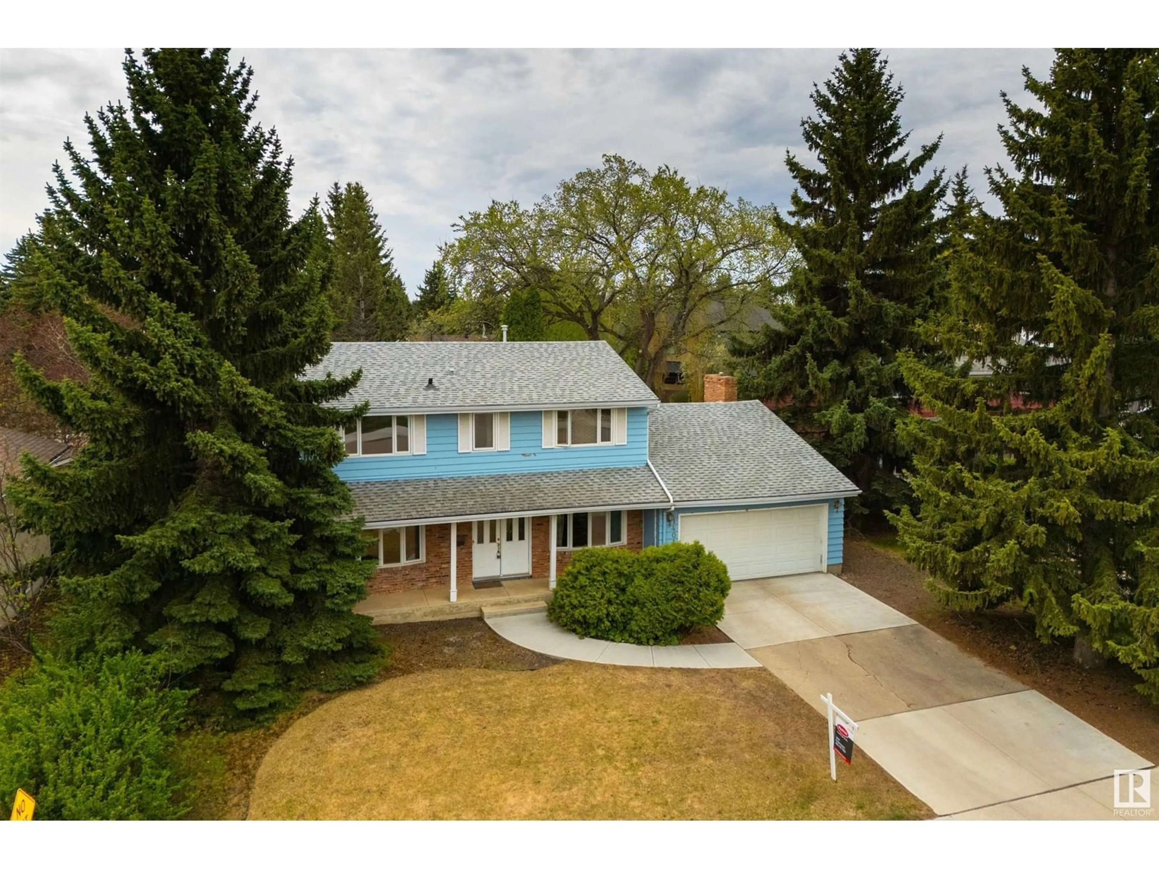 A pic from outside/outdoor area/front of a property/back of a property/a pic from drone, street for 14011 53 AV, Edmonton Alberta T6H0S9