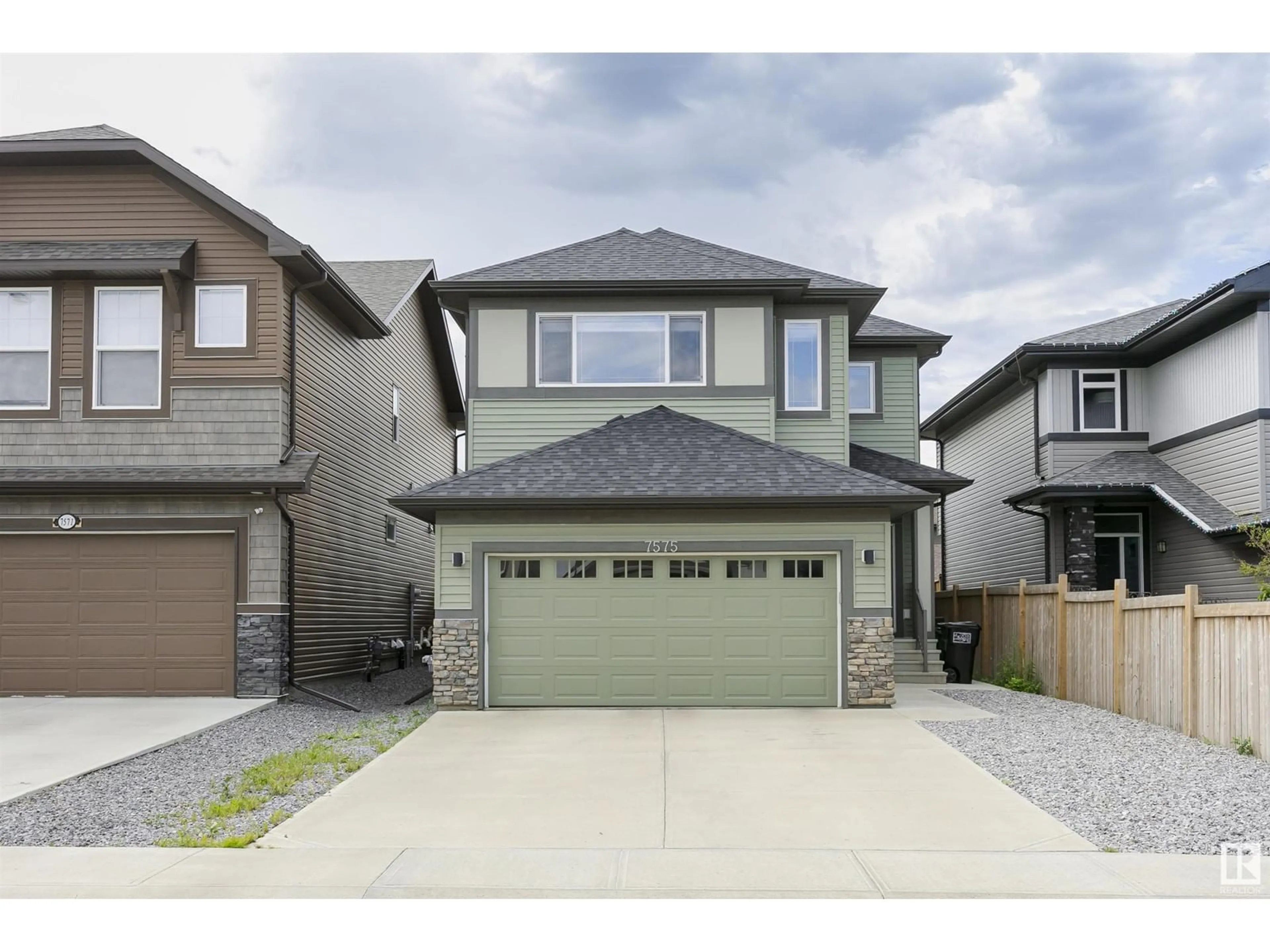 Home with vinyl exterior material, street for 7575 176 AV, Edmonton Alberta T5Z0R3