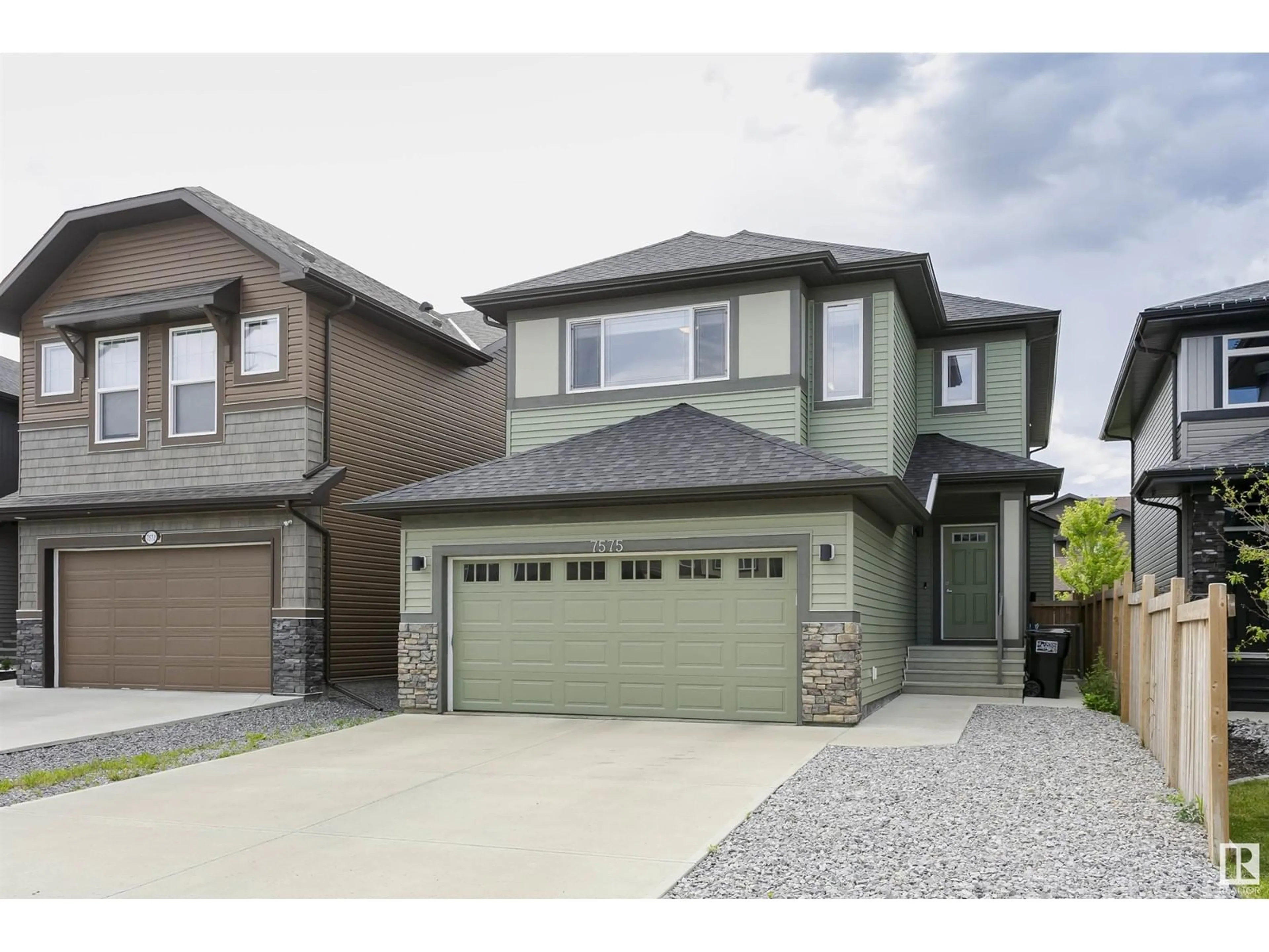 Home with vinyl exterior material, street for 7575 176 AV, Edmonton Alberta T5Z0R3