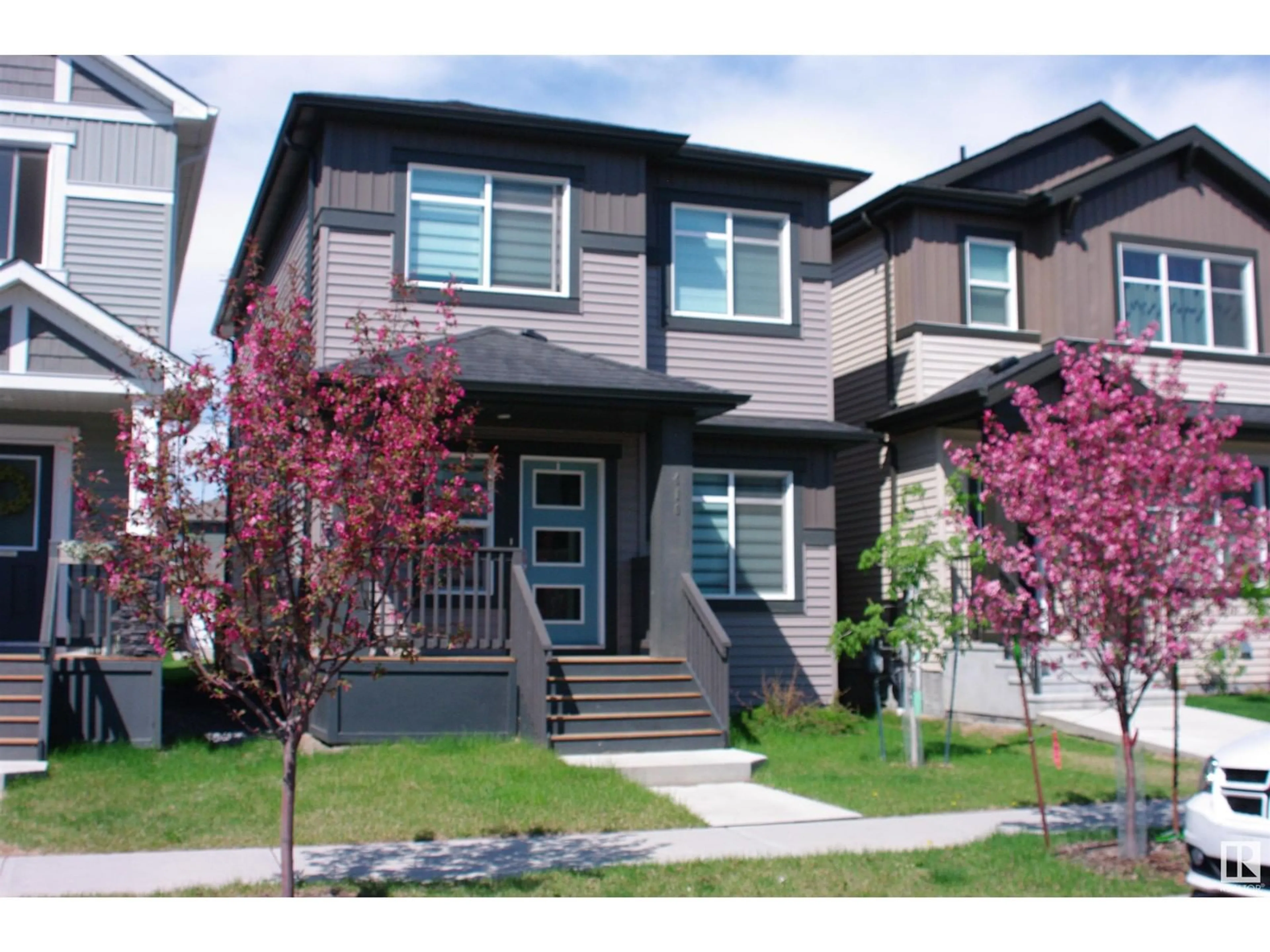 Home with vinyl exterior material, street for 410 BLACK STONE LI, Leduc Alberta T9E1L8
