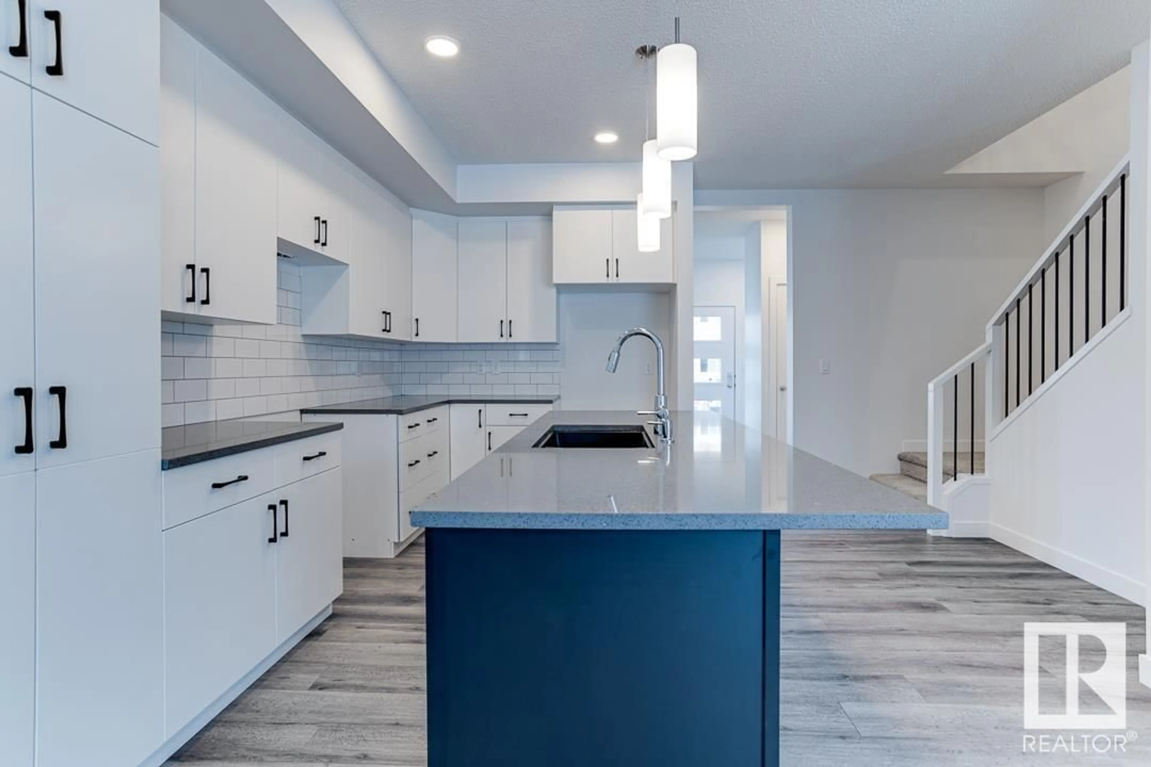 Open concept kitchen, ceramic/tile floor for 410 BLACK STONE LI, Leduc Alberta T9E1L8