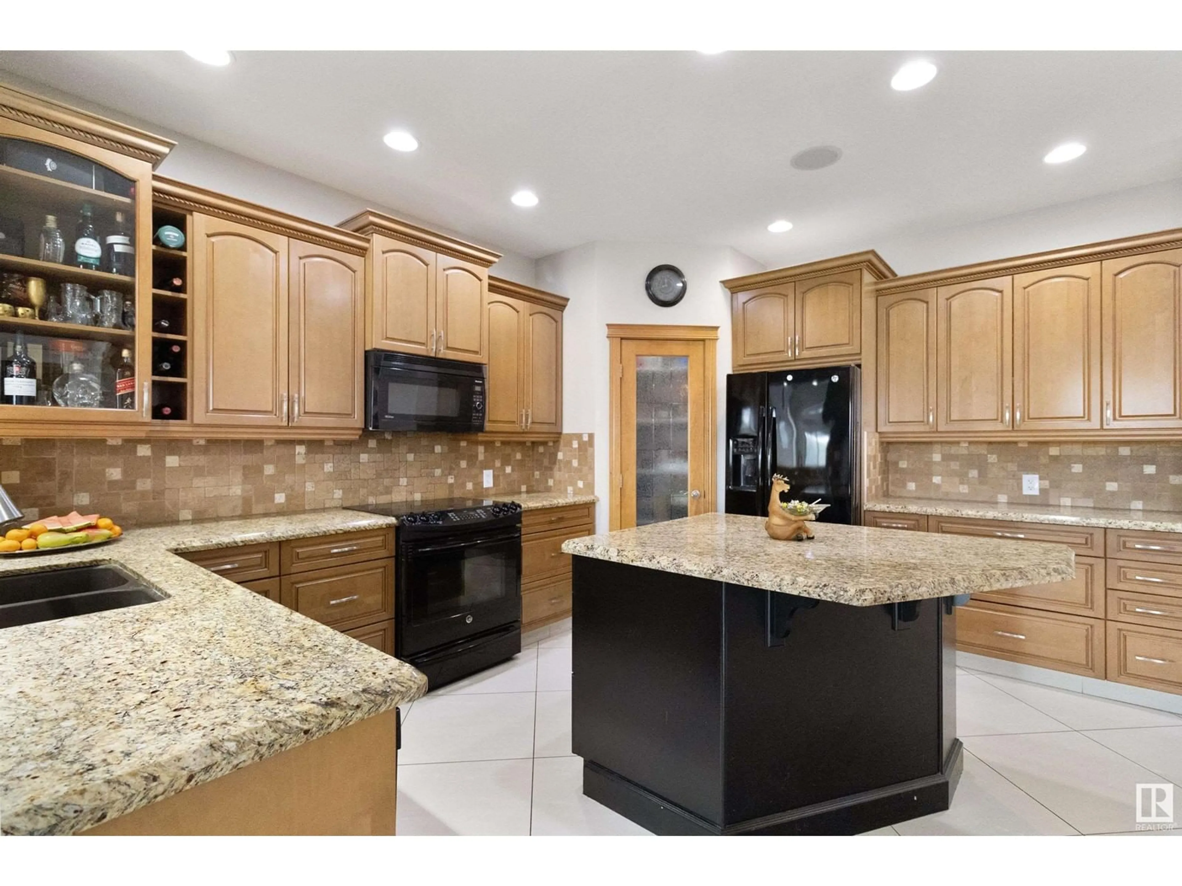 Open concept kitchen, ceramic/tile floor for 10824 179 AV, Edmonton Alberta T5X6K5