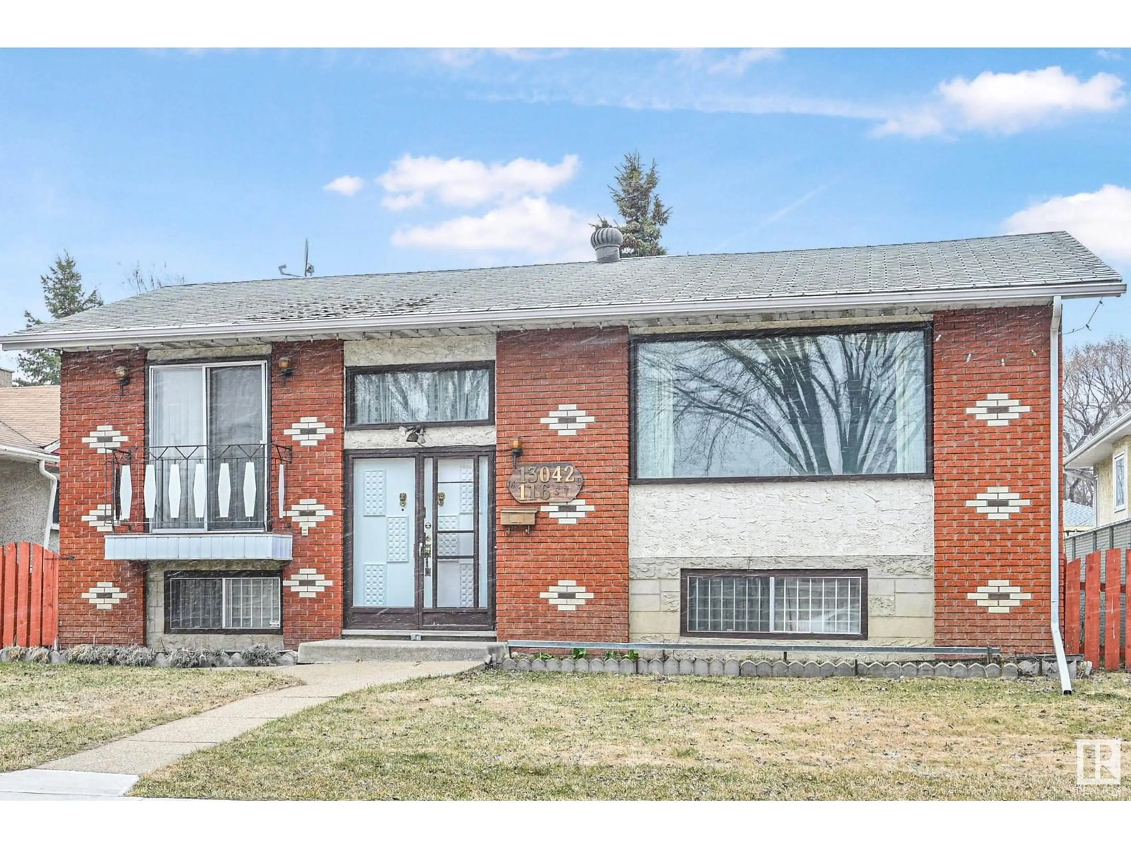 Home with brick exterior material, street for 13042 116 ST, Edmonton Alberta T5E5H5