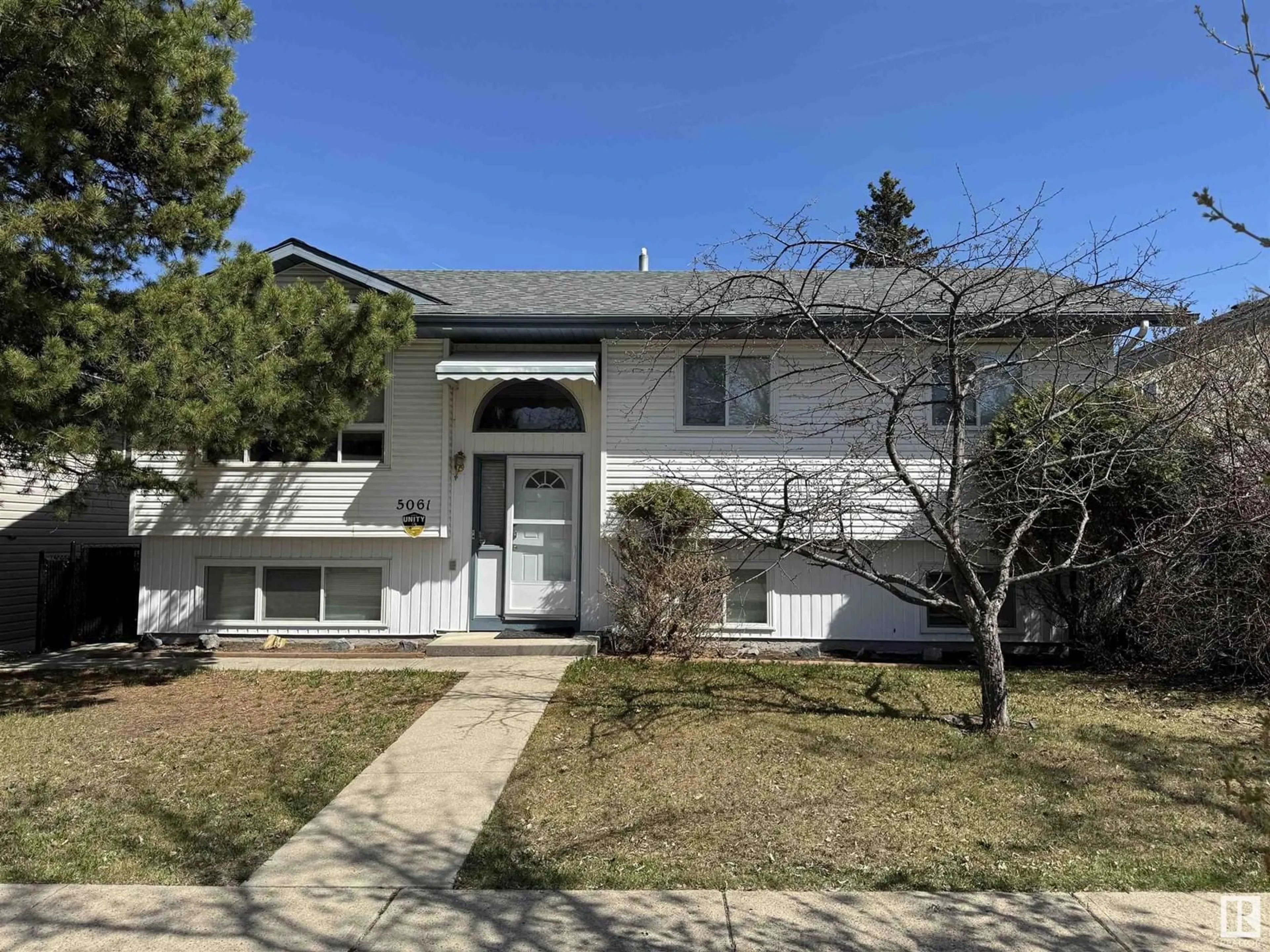 Home with vinyl exterior material, street for 5061 44 ST, Drayton Valley Alberta T7A1B7