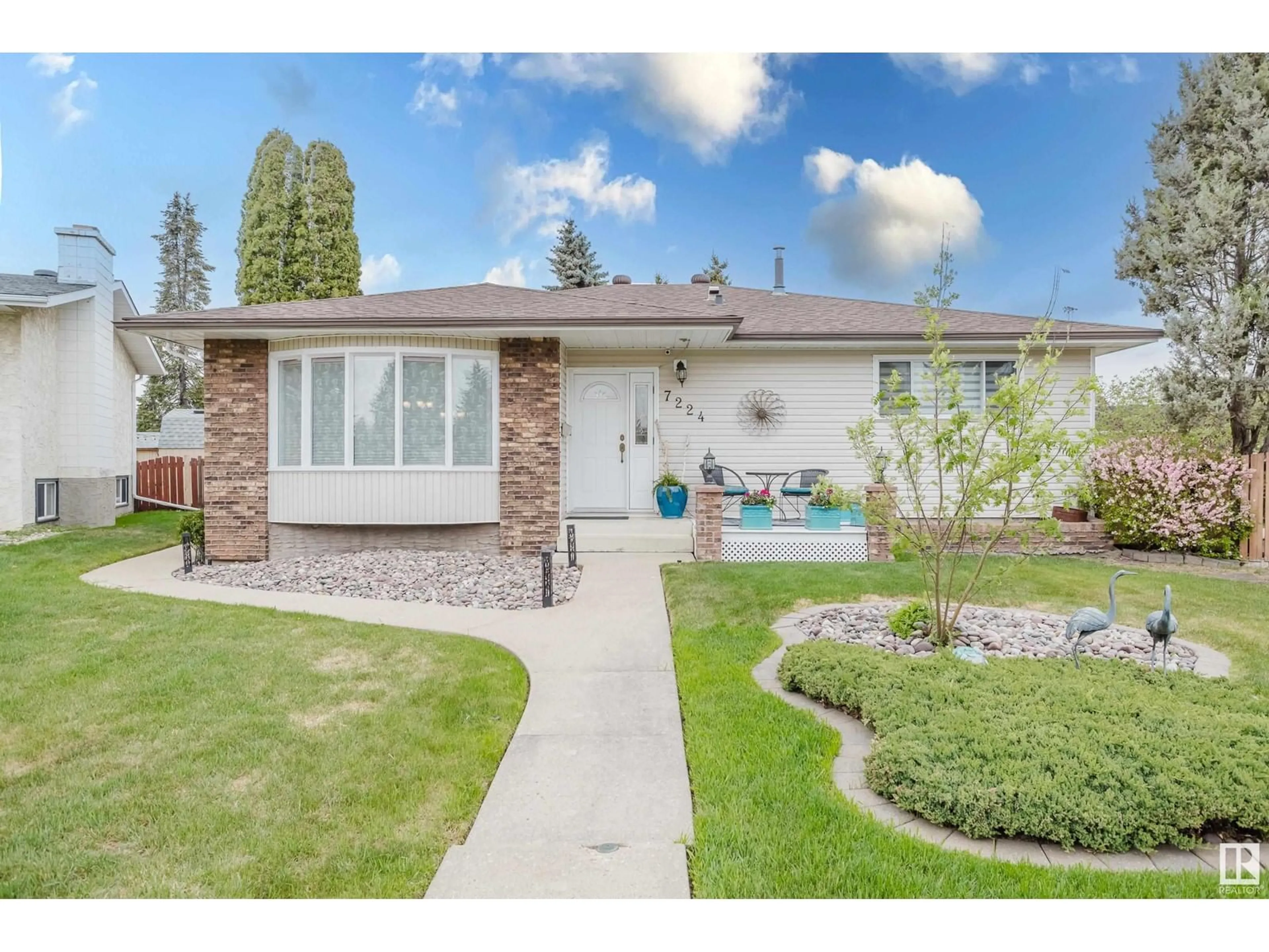 Home with vinyl exterior material, street for 7224 11 AV, Edmonton Alberta T6K3R1