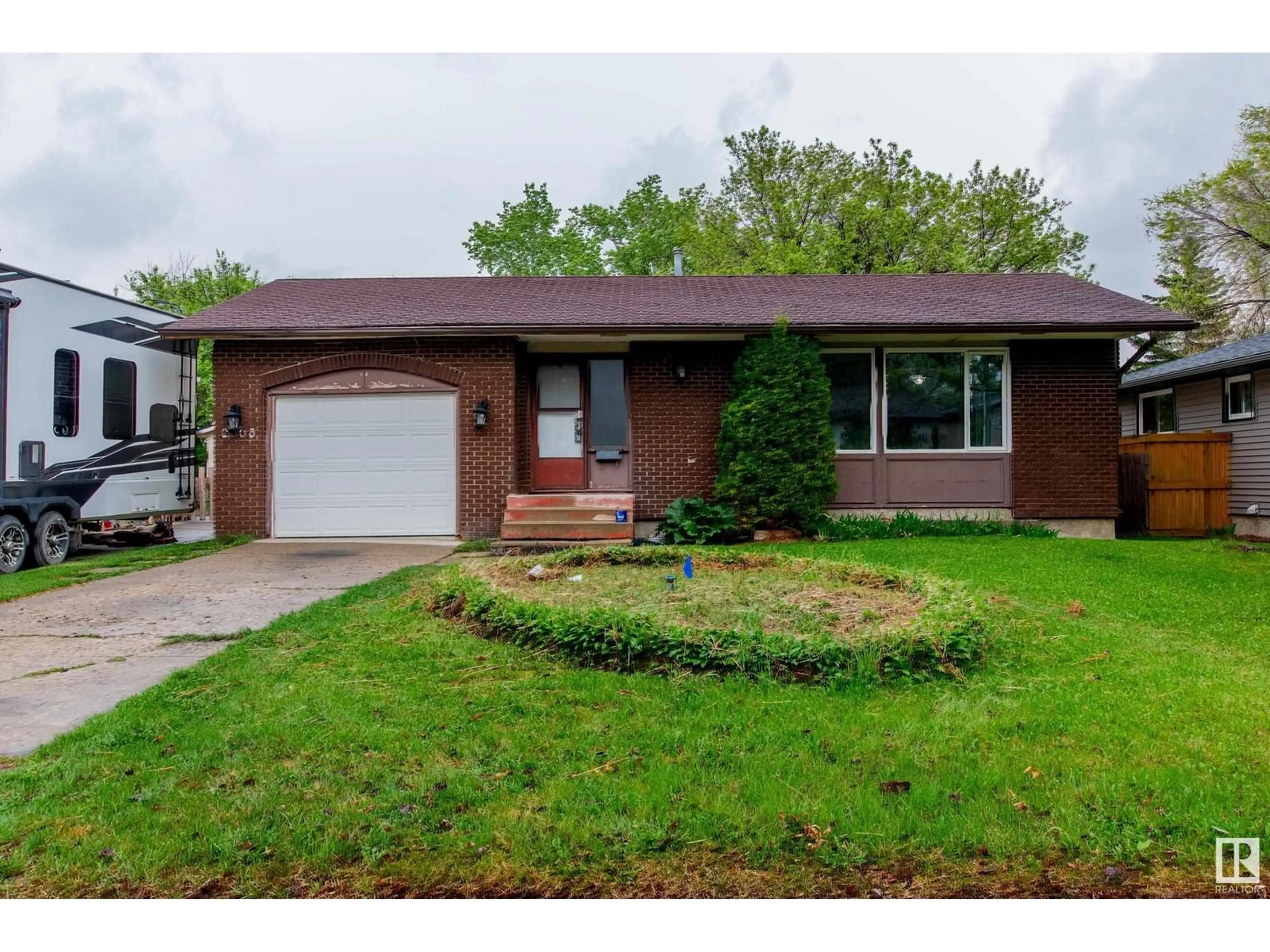 Home with brick exterior material, street for NW - 2103 67 ST, Edmonton Alberta T6K2H7