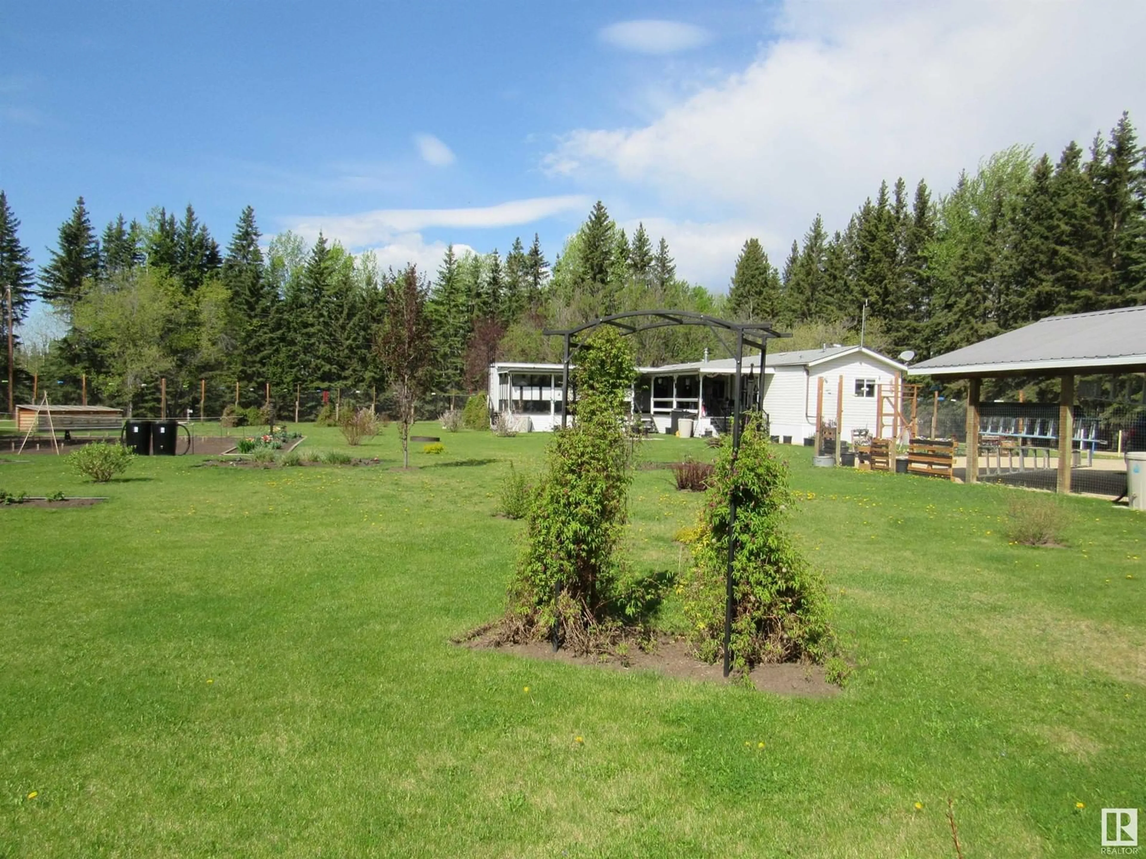 A pic from outside/outdoor area/front of a property/back of a property/a pic from drone, forest/trees view for 623005 RGE RD 60, Rural Woodlands County Alberta T0G1A0