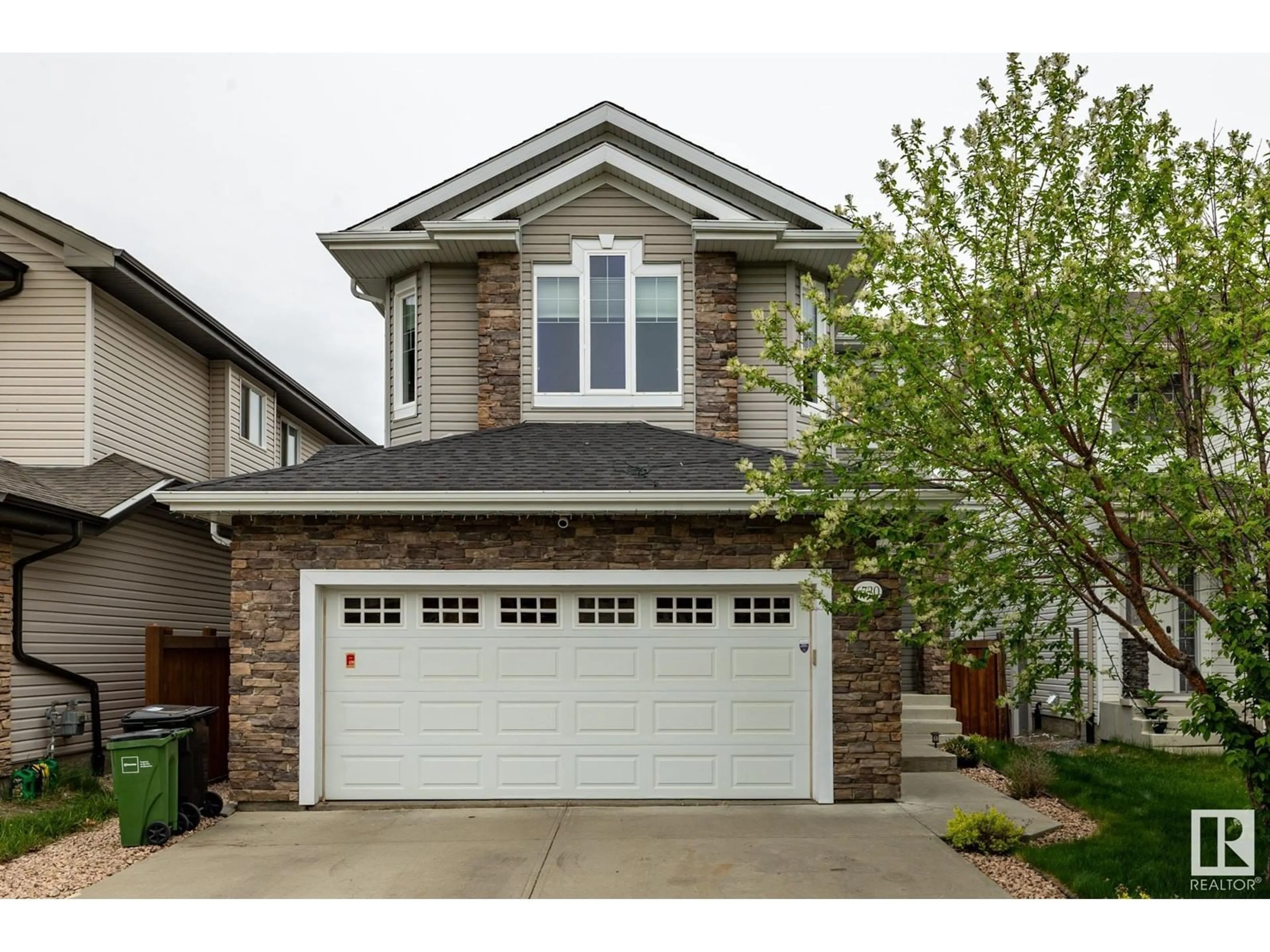 Home with vinyl exterior material, street for 6720 19 AVE SW, Edmonton Alberta T6X0L9