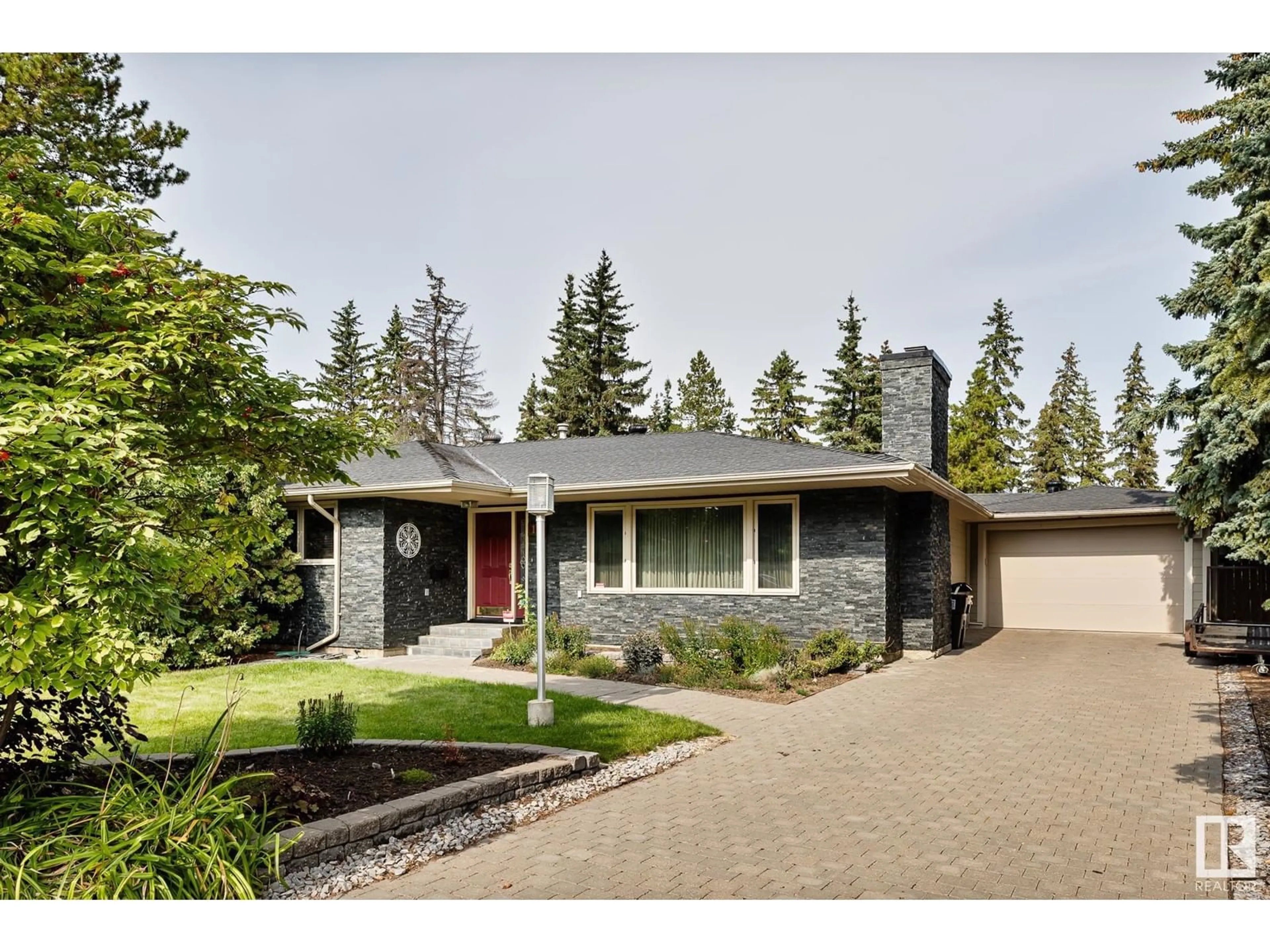 Home with brick exterior material, street for 16 QUESNELL CR, Edmonton Alberta T5R5N9
