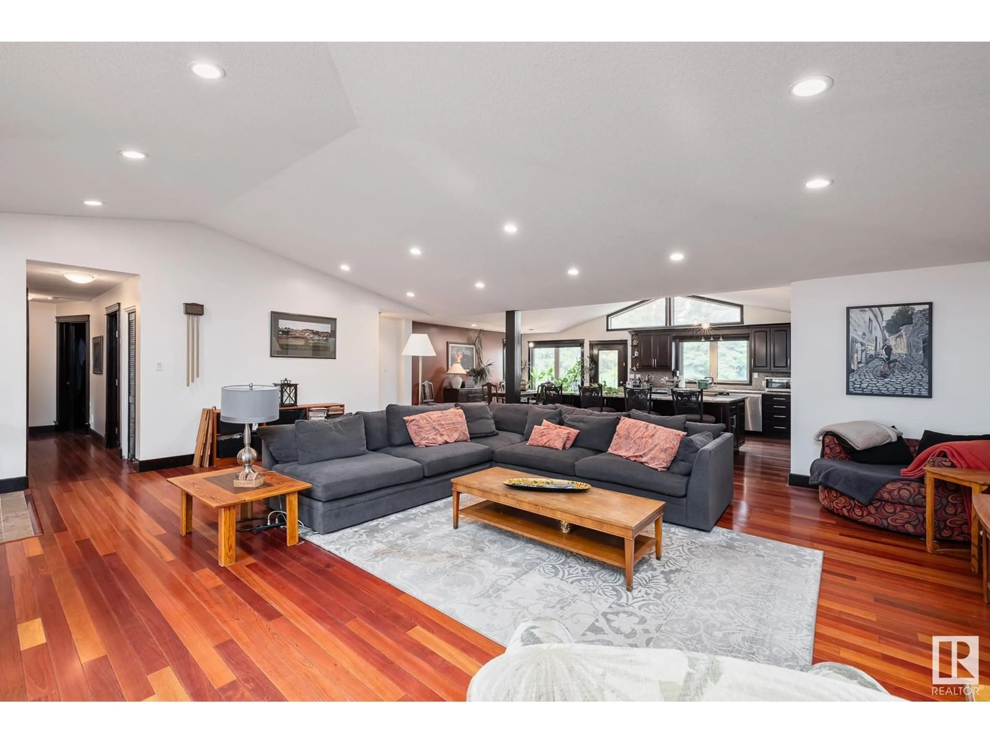 Living room with furniture, wood/laminate floor for 16 QUESNELL CR, Edmonton Alberta T5R5N9