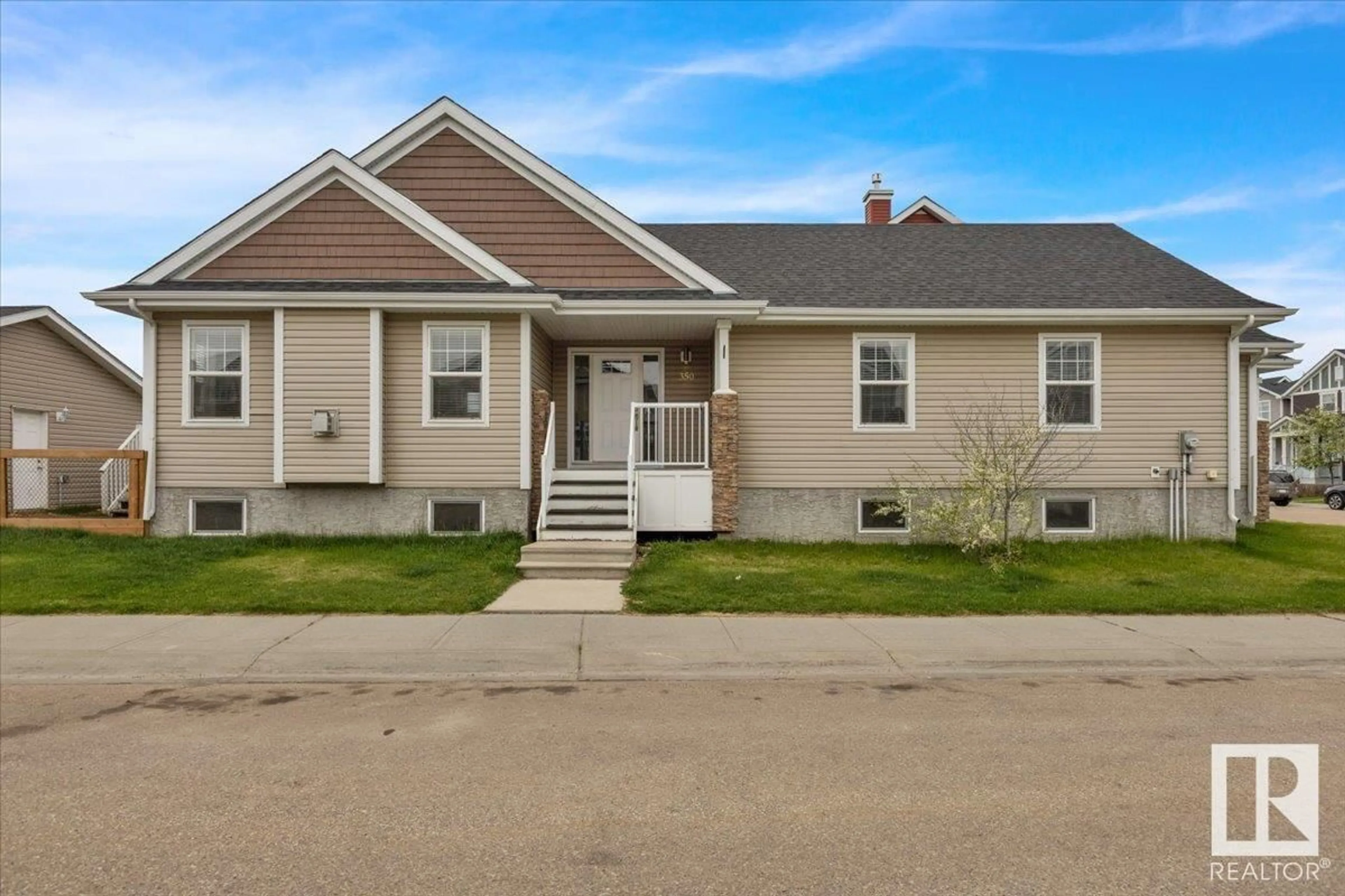 Home with vinyl exterior material, street for 350 SIMMONDS WY, Leduc Alberta T9E0X3