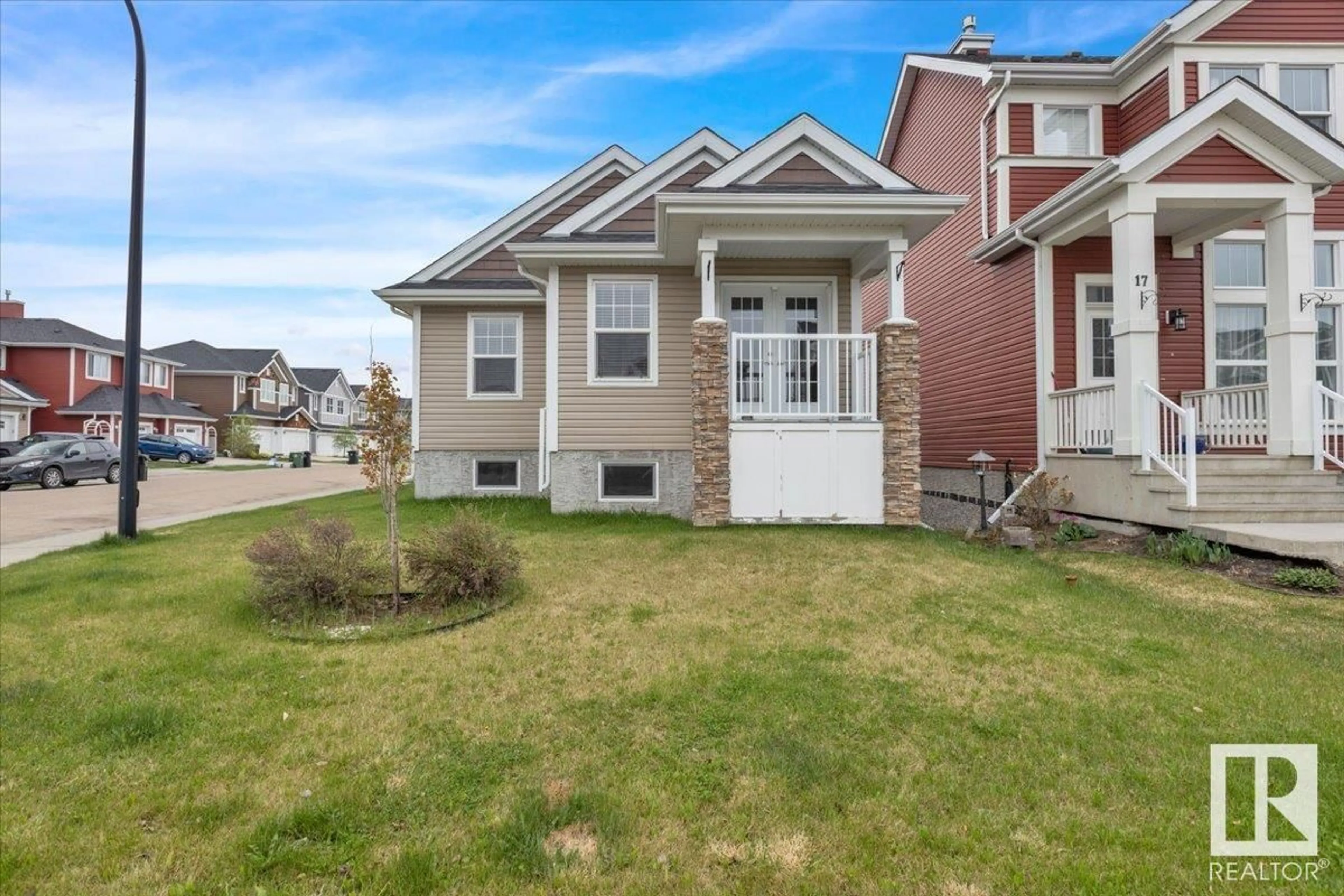 Home with vinyl exterior material, street for 350 SIMMONDS WY, Leduc Alberta T9E0X3