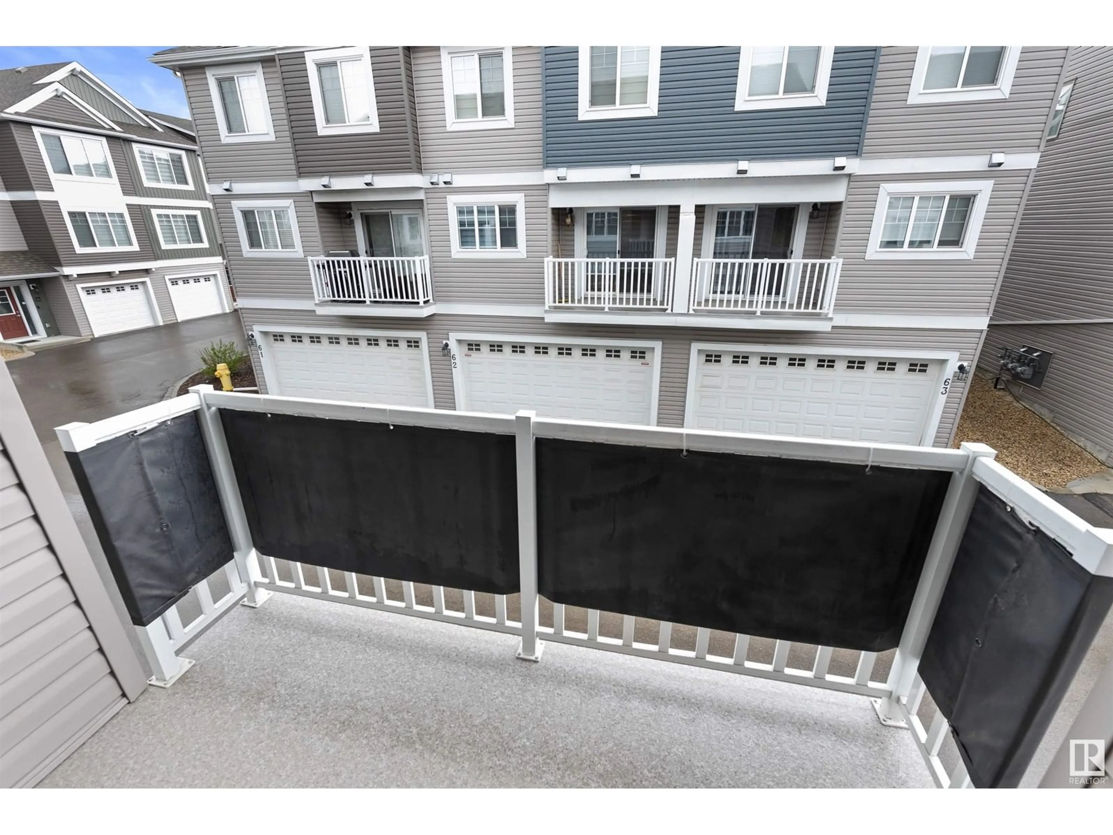 Patio, city buildings view from balcony for #30 - 1391 STARLING DR, Edmonton Alberta T5S0L3