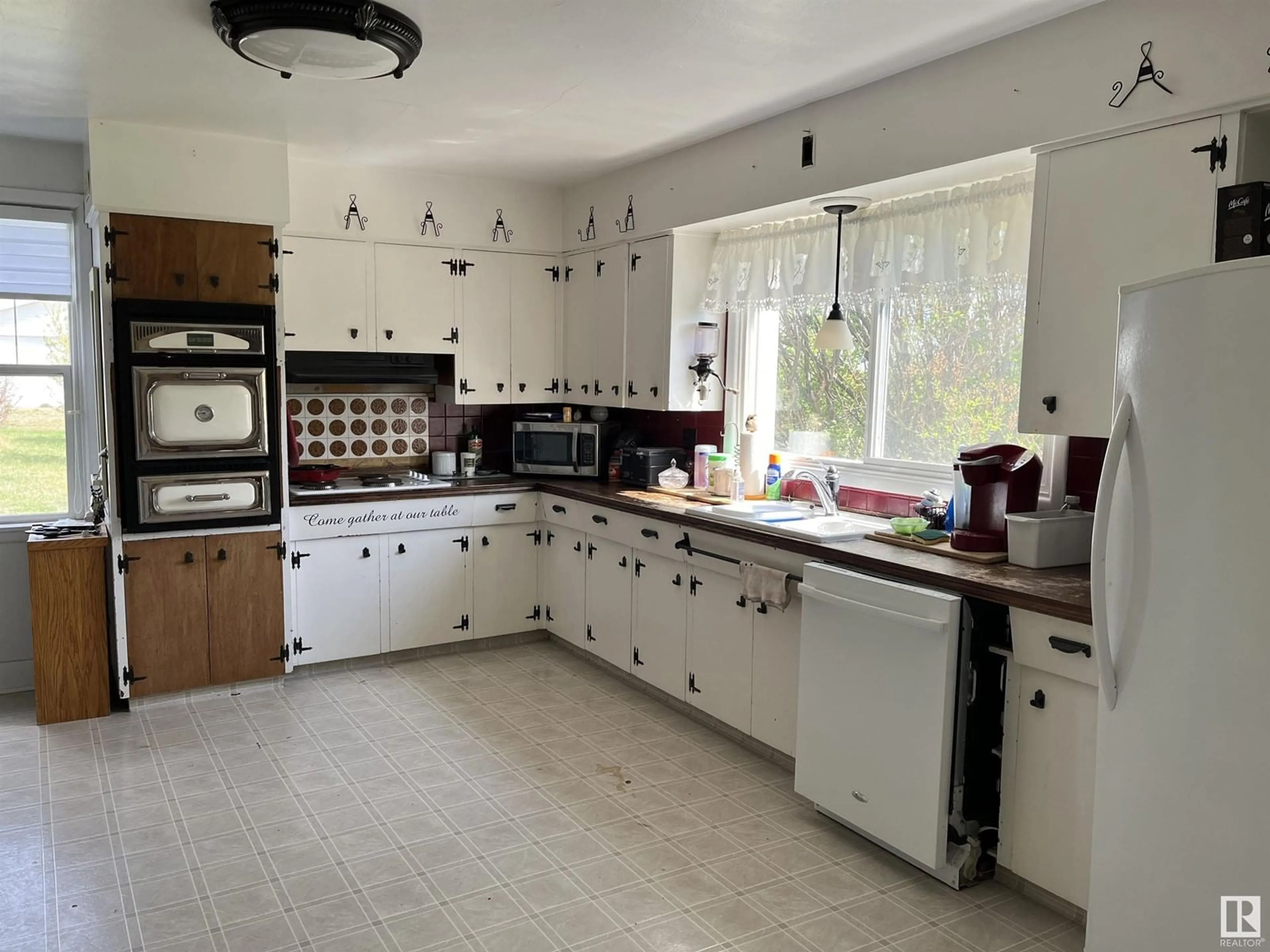 Standard kitchen, ceramic/tile floor for 4301 66 STREET, Rural Bonnyville M.D. Alberta T9N2H5