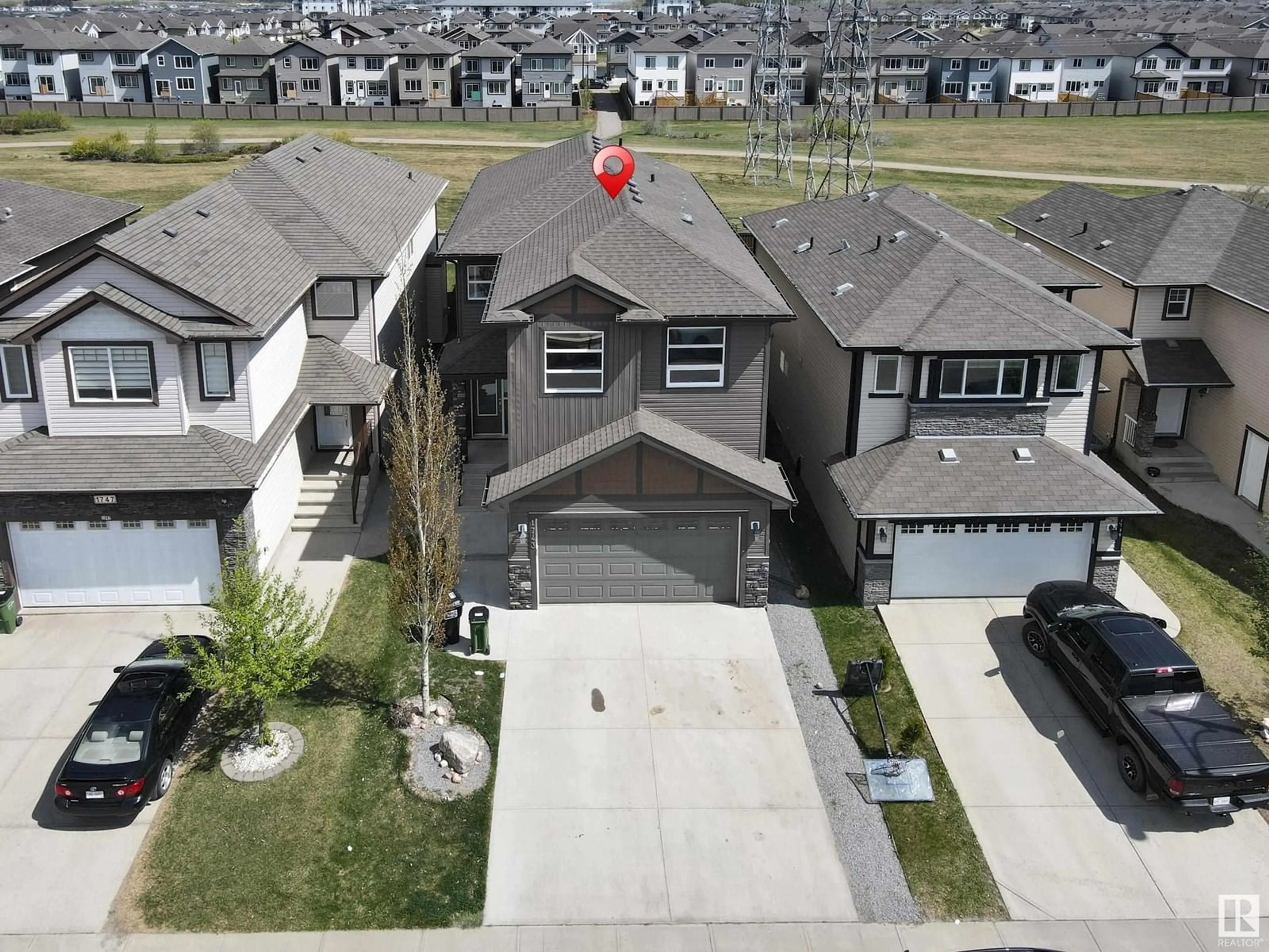 A pic from outside/outdoor area/front of a property/back of a property/a pic from drone, street for 1743 28 ST, Edmonton Alberta T6T0Z6