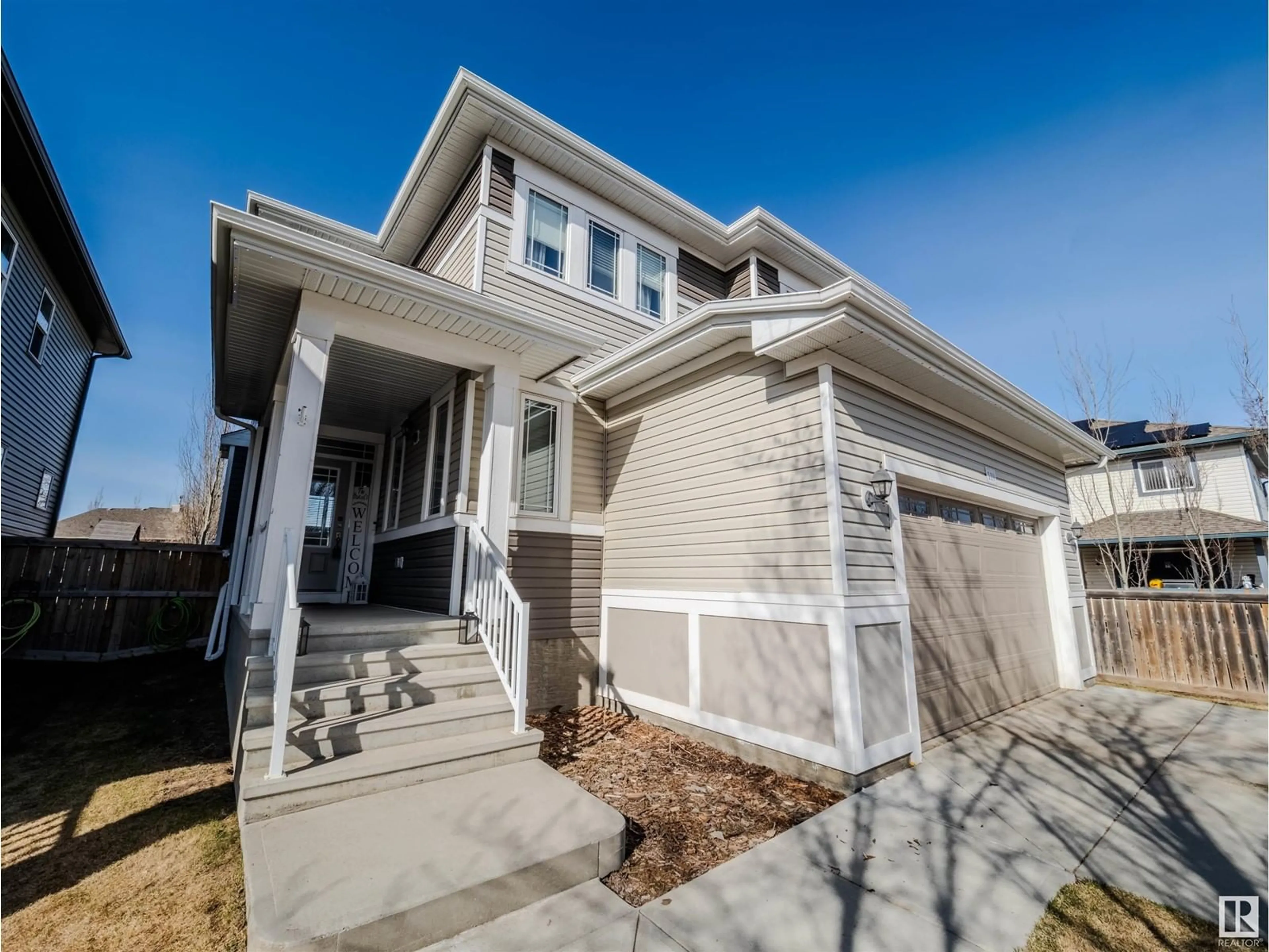 Home with vinyl exterior material, street for 119 RIDEAU CR, Beaumont Alberta T4X1Z6