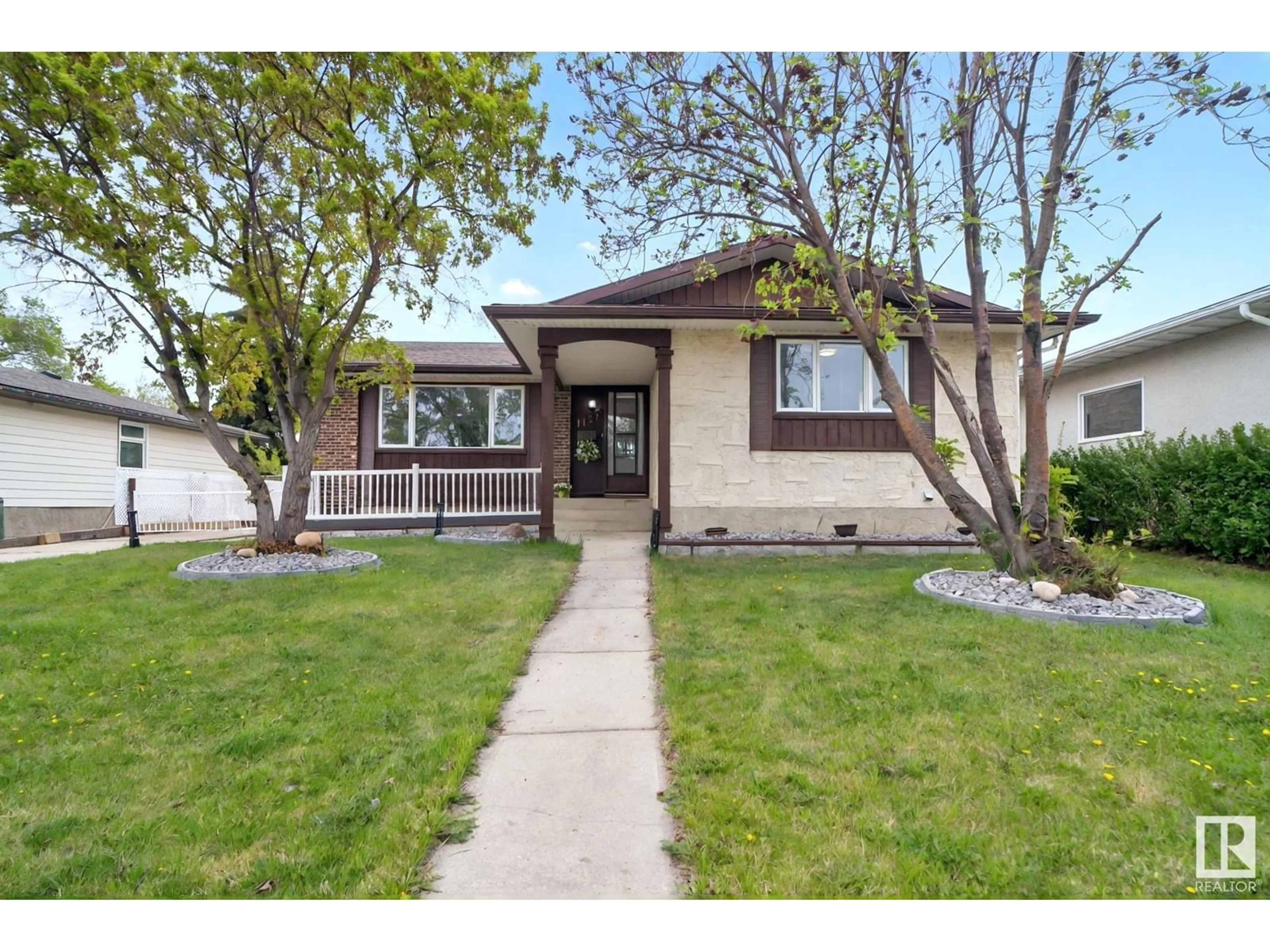 Home with vinyl exterior material, street for NW - 1157 75 ST, Edmonton Alberta T6K2S4