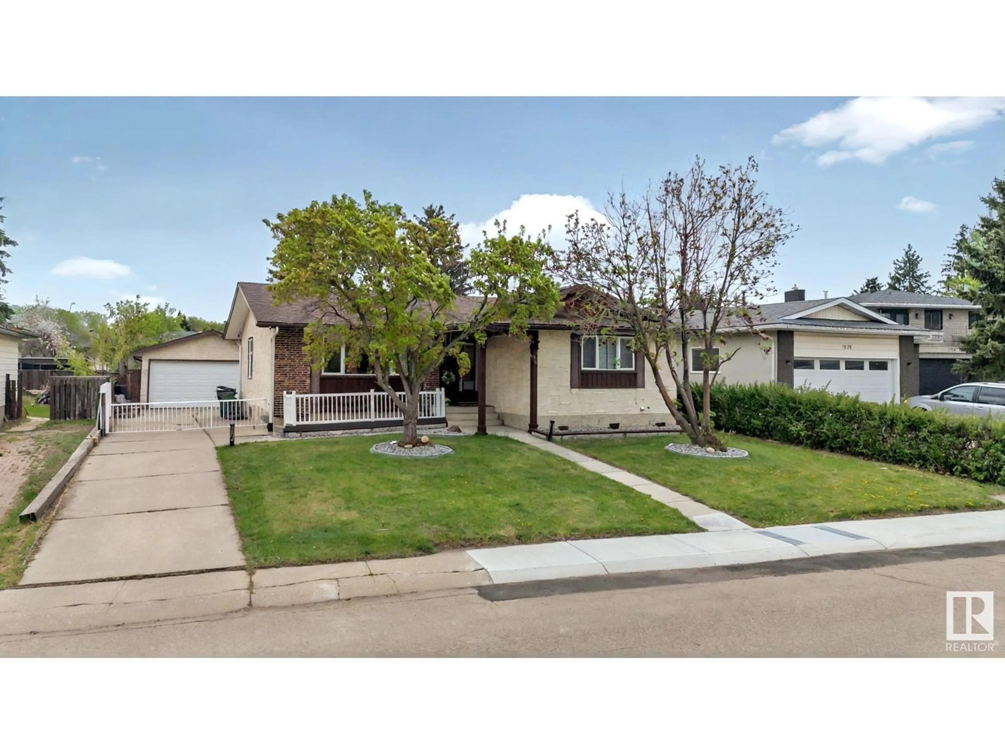 Home with vinyl exterior material, street for NW - 1157 75 ST, Edmonton Alberta T6K2S4