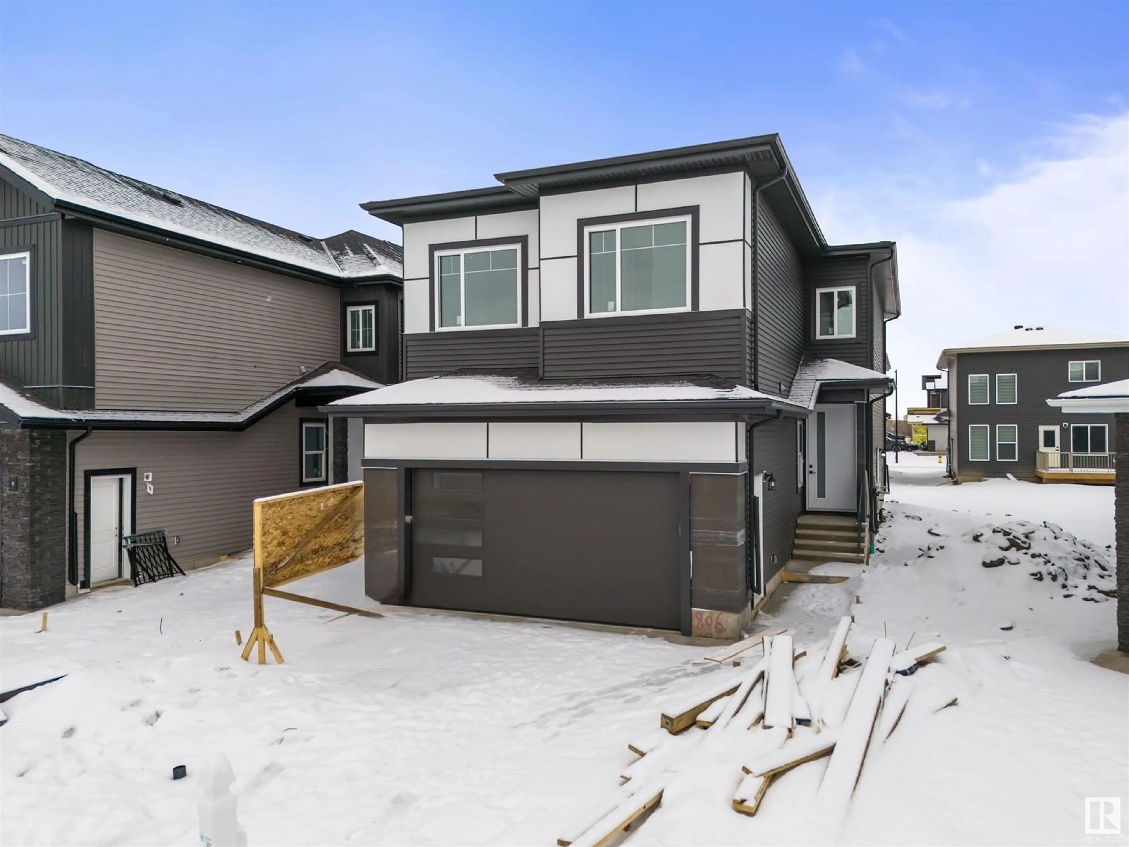 Home with vinyl exterior material, street for NE - 1806 62 AVE, Rural Leduc County Alberta T4X0P5