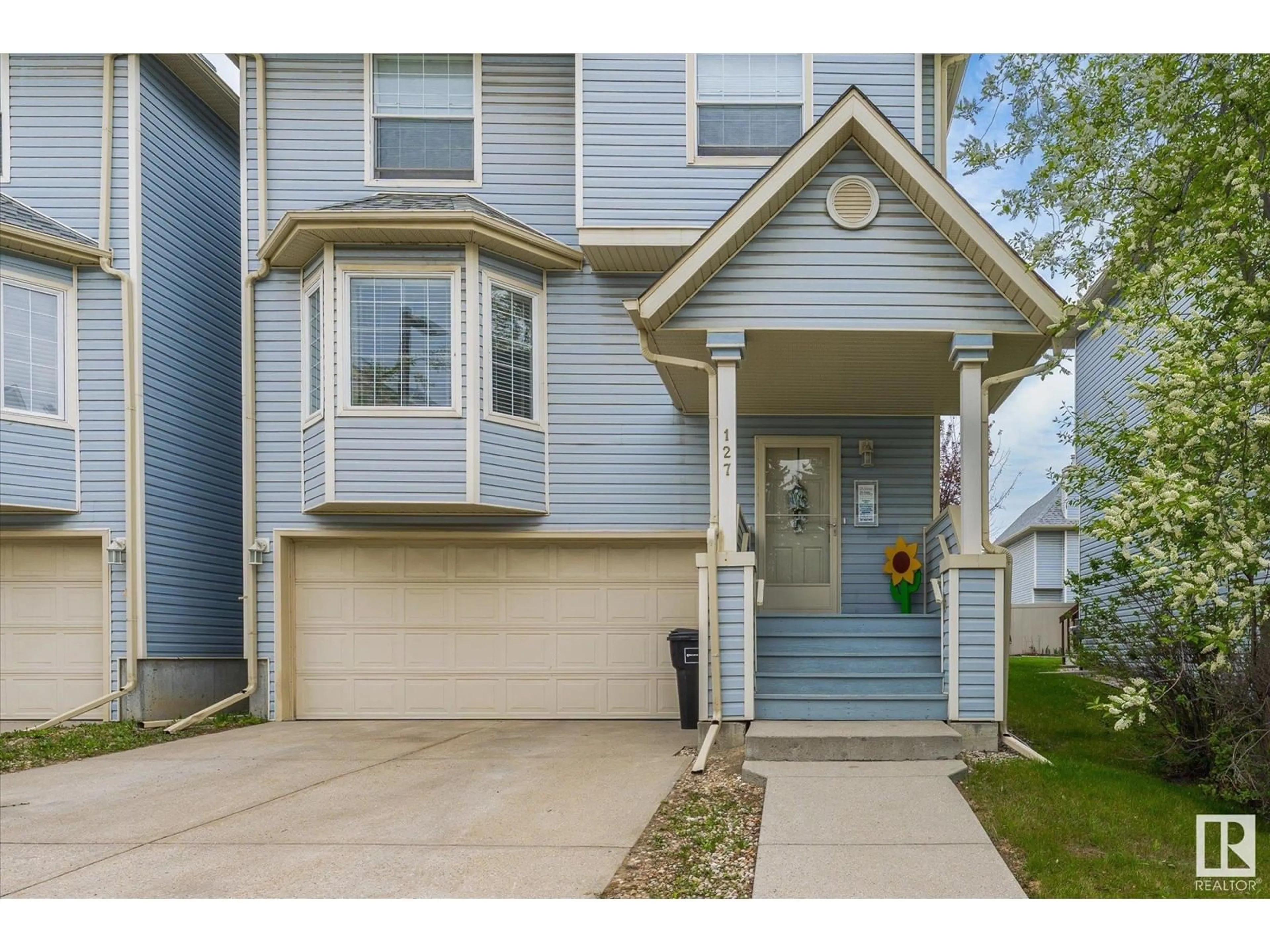 Home with vinyl exterior material, street for #127 - 1670 JAMHA RD, Edmonton Alberta T6L7B3