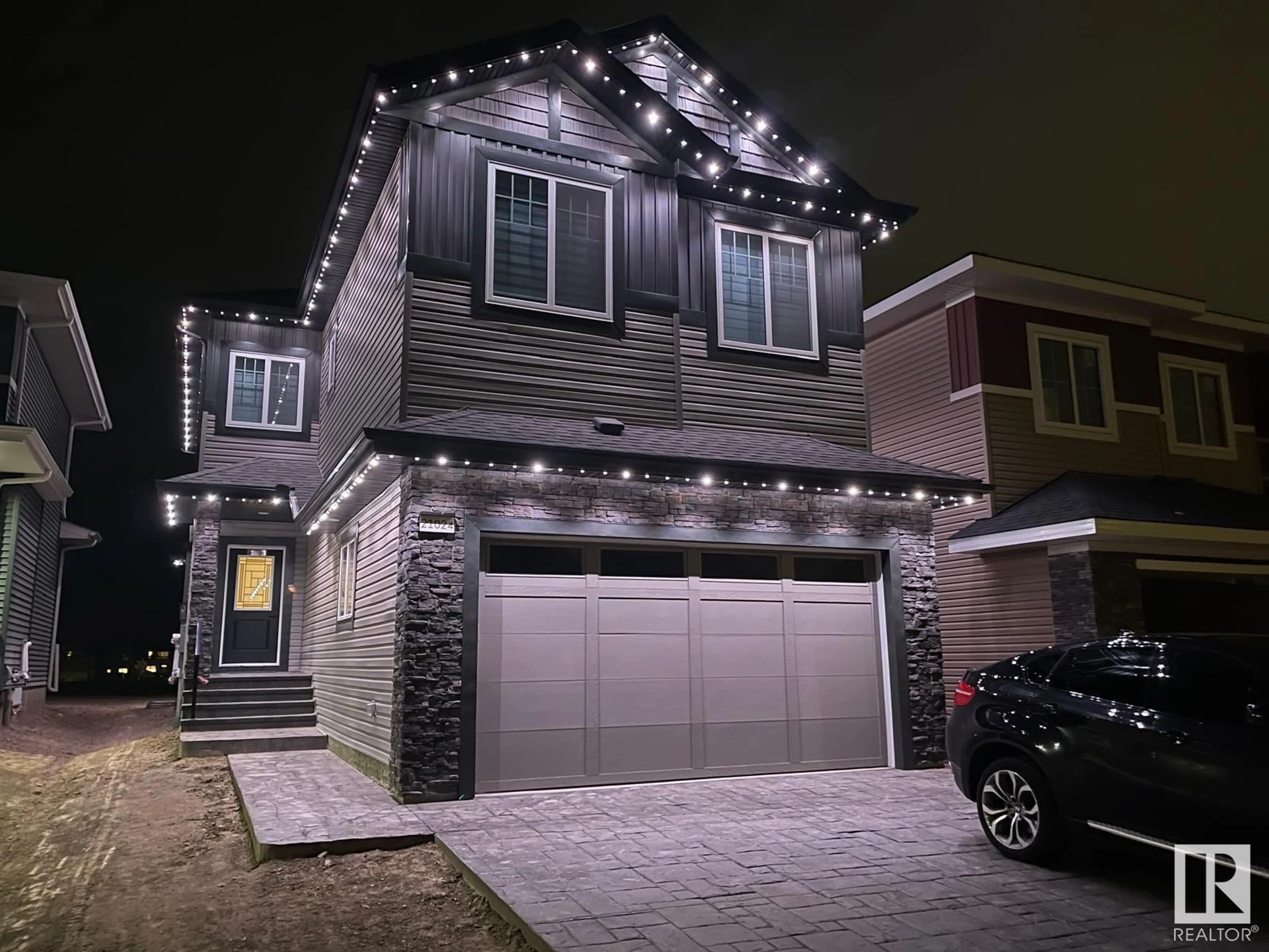 Home with vinyl exterior material, street for 21024 128 AV, Edmonton Alberta T5V1C0