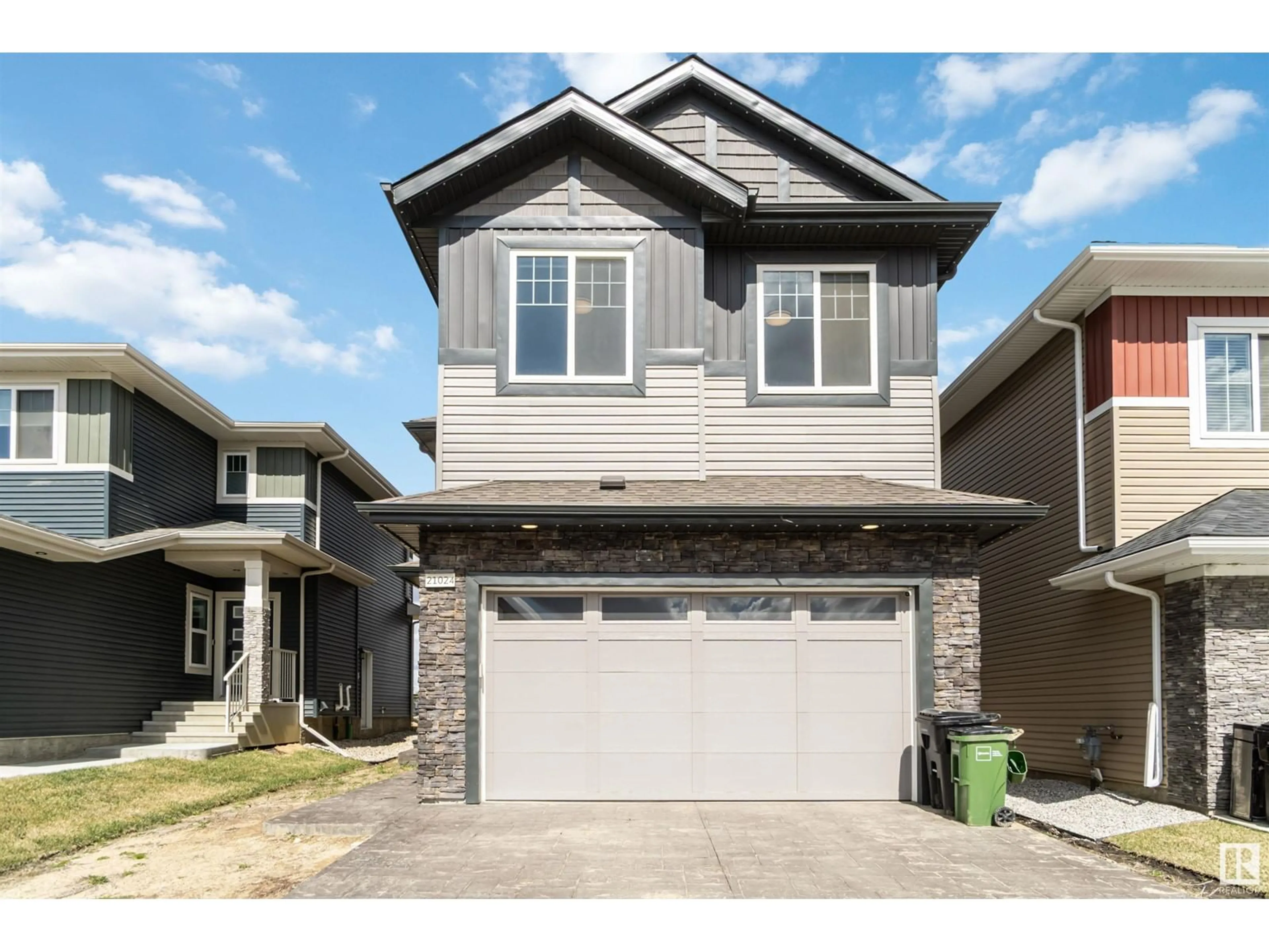 Home with vinyl exterior material, street for 21024 128 AV, Edmonton Alberta T5V1C0